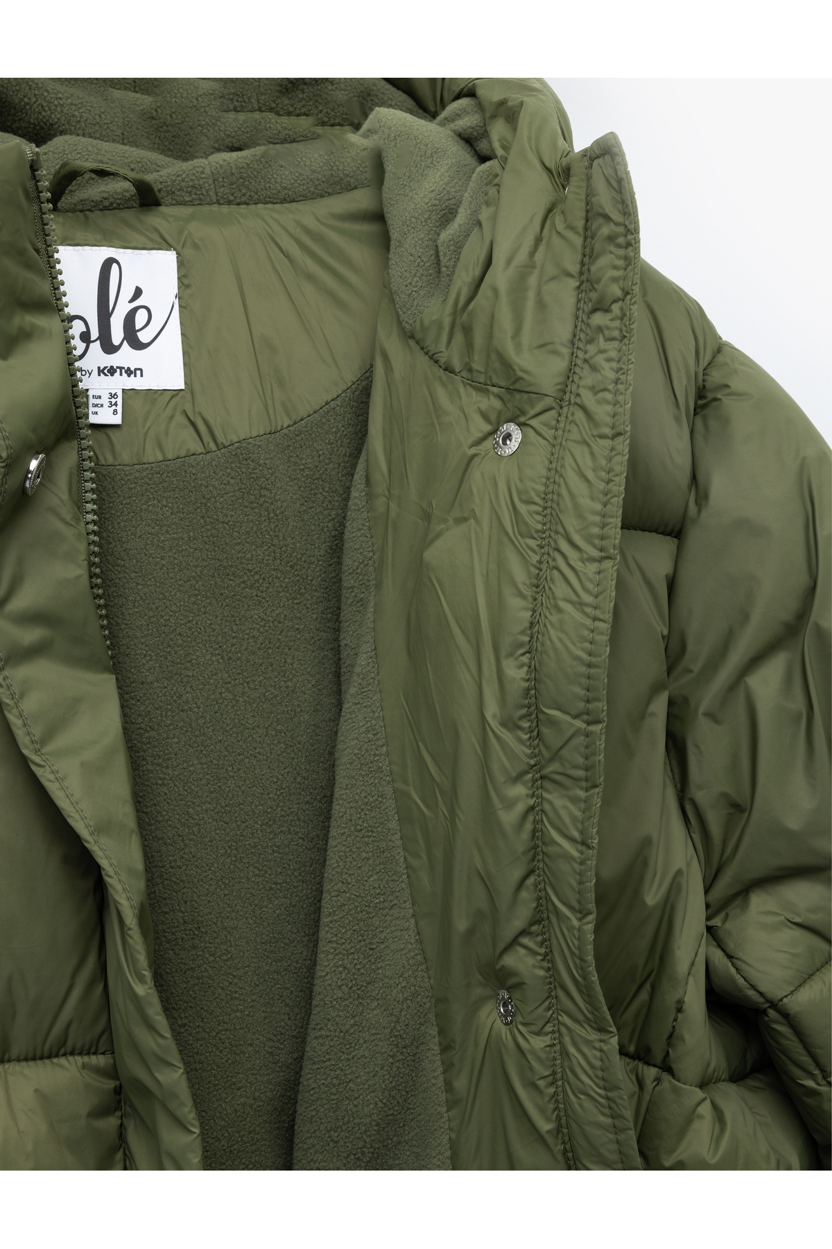 کاپشن پفی کلاه‌دار، آستین بلند، جیب‌دار و زیپ‌دار کوتون