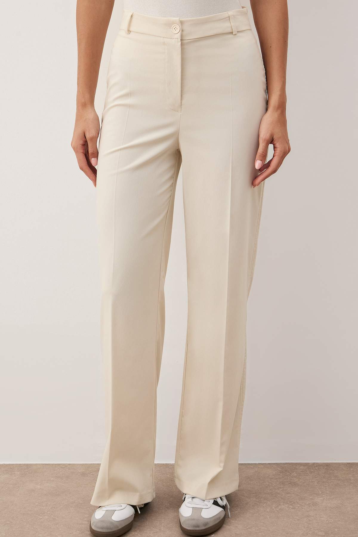 Trendyol Collection Spodnie z wysokim stanem i szerokimi nogawkami w kolorze beżowym - Twoss23Pl00314