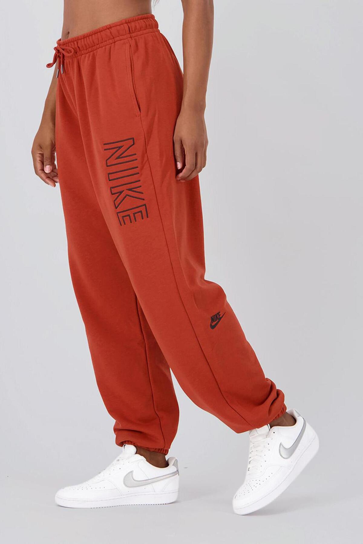 orange nike sweatpants womens