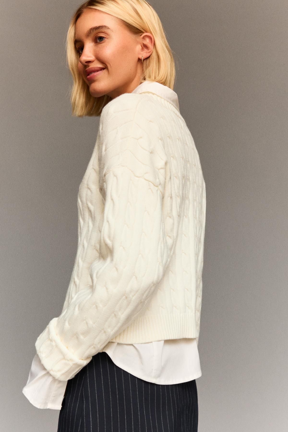 Bershka İşlemeli saç örgülü kazak