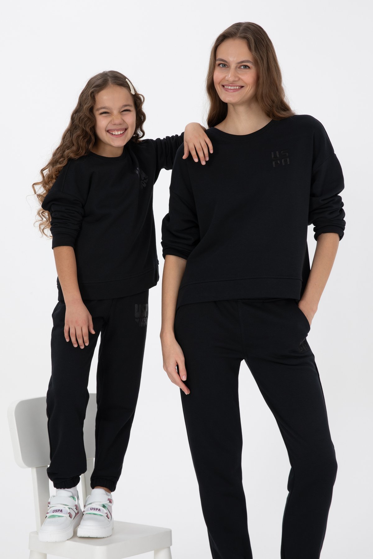 سویشرت یقه گرد طرح دار دخترانه مشکی براق یو اس پولو کد :(50314289-VR046) U.S. Polo Assn.