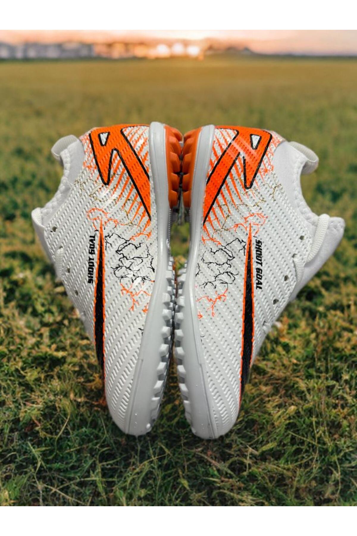 Children's astro pitch boots and astro pitch football shoes with white-orange socks