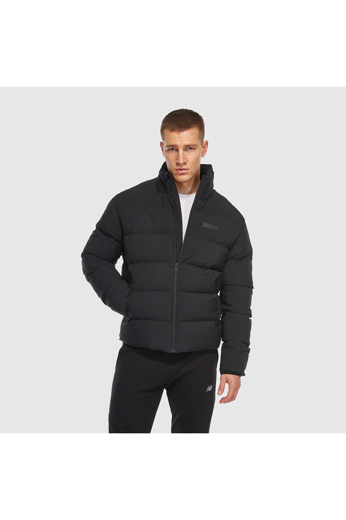 ژاکت مردانه مشکی سبک زندگی نیو بالانس کاپشن New Balance