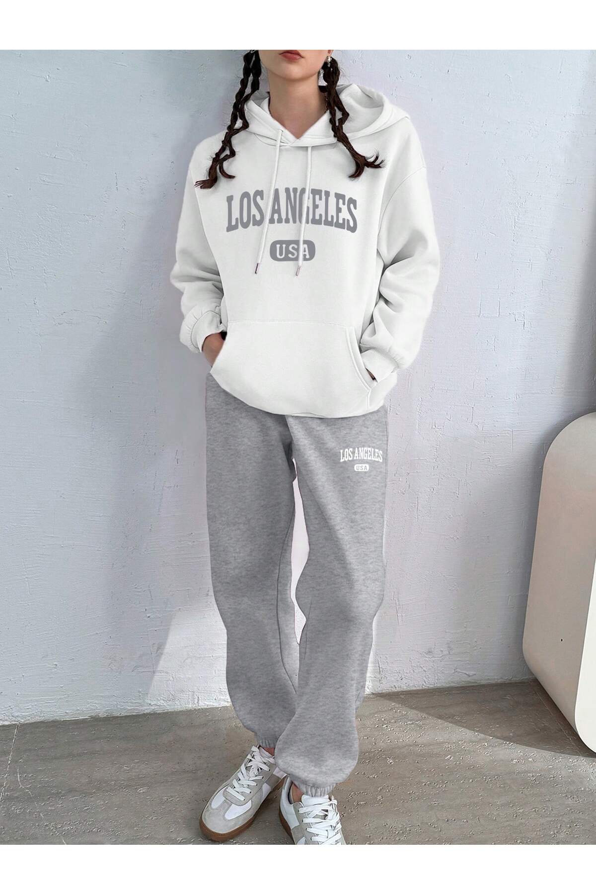 طقم سويتشيرت بغطاء رأس وبنطال رياضي 3 خيوط بطبعة Los Angeles للجنسين
