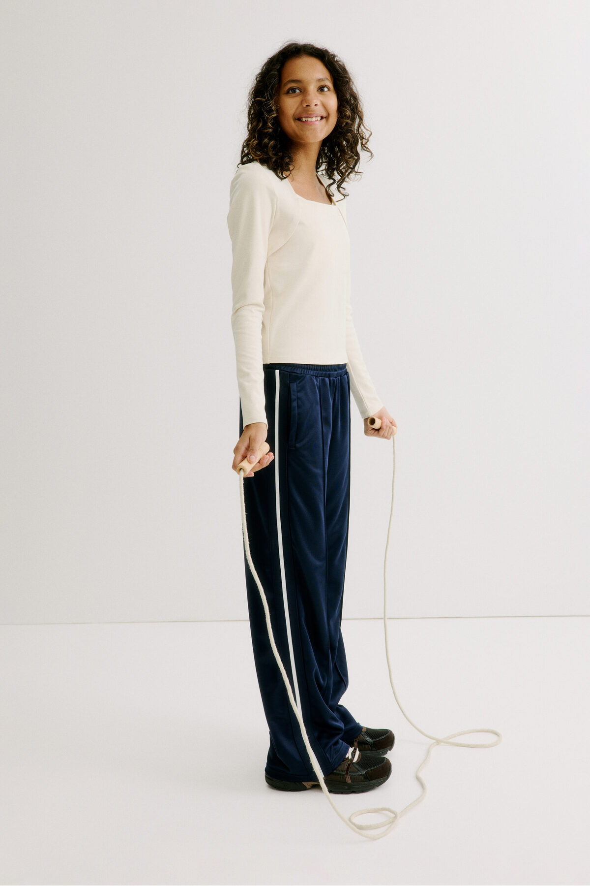 شلوار ورزشی گشاد DryMove™ اچ اند ام شلوار گرمکن ورزشی H&M