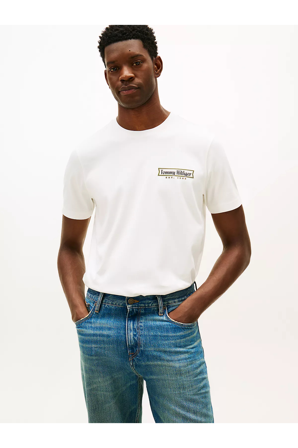 تامی هیلفیگر تی‌شرت آستین کوتاه مردانه طرح لوگو سیگنچر یقه گرد معمولی MW0MW41463-YBL