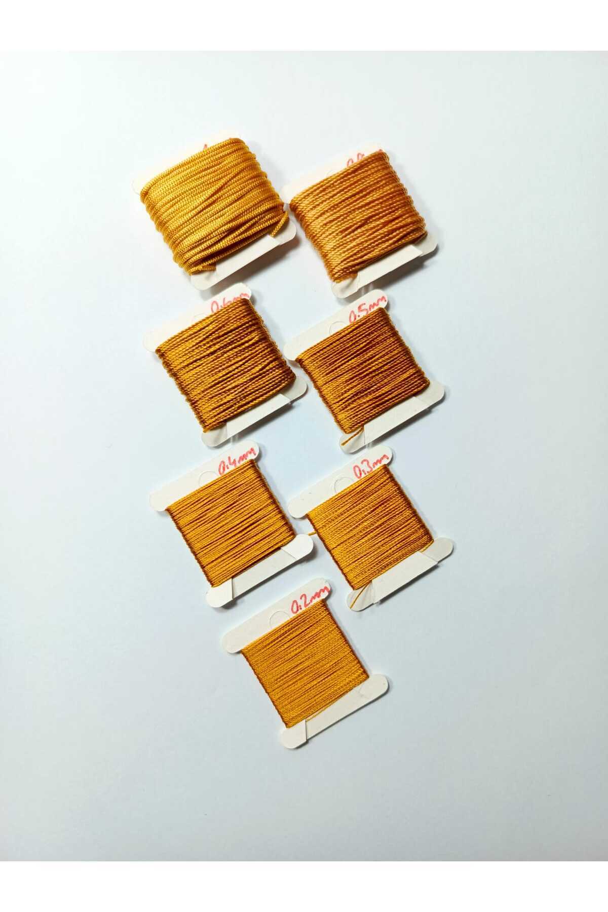 10 Metre 7 Ölçü Tesbih Ipi Seti 0.2 Mm 0.3 Mm 0.4 Mm 0.5 Mm 0.6 Mm 0.8 Mm 1 Mm Altın Toplam 70 Metre