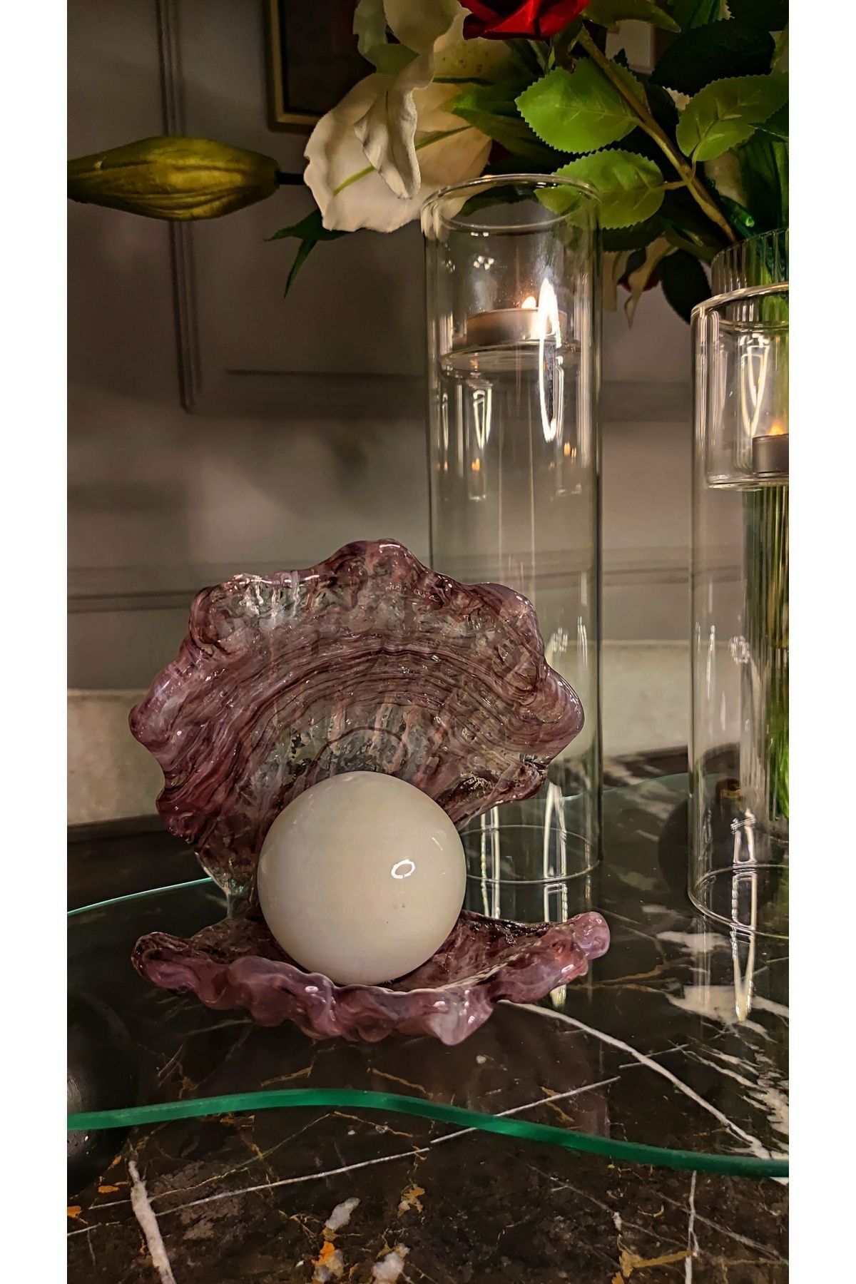 Handmade decorative glass object with purple and white pearl detail