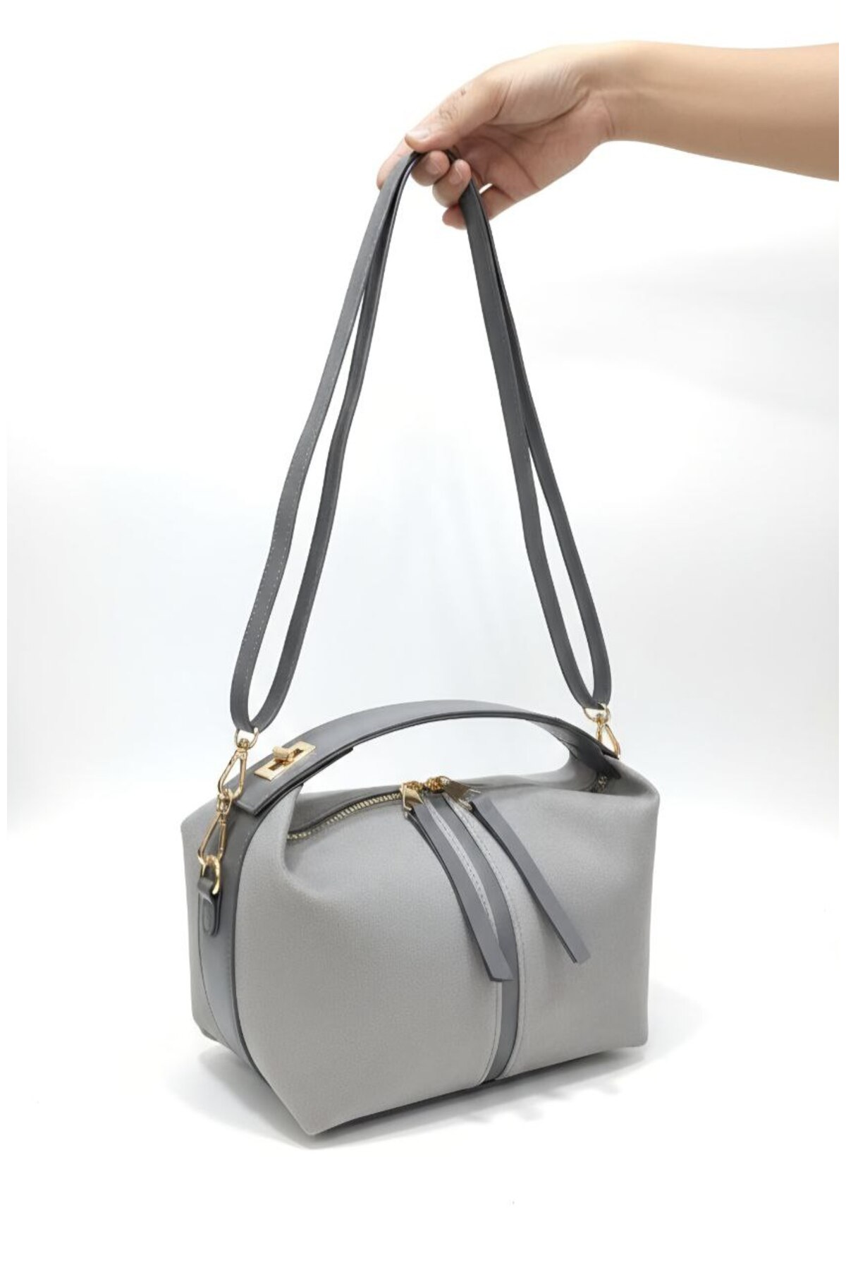 women hand and shoulder bag