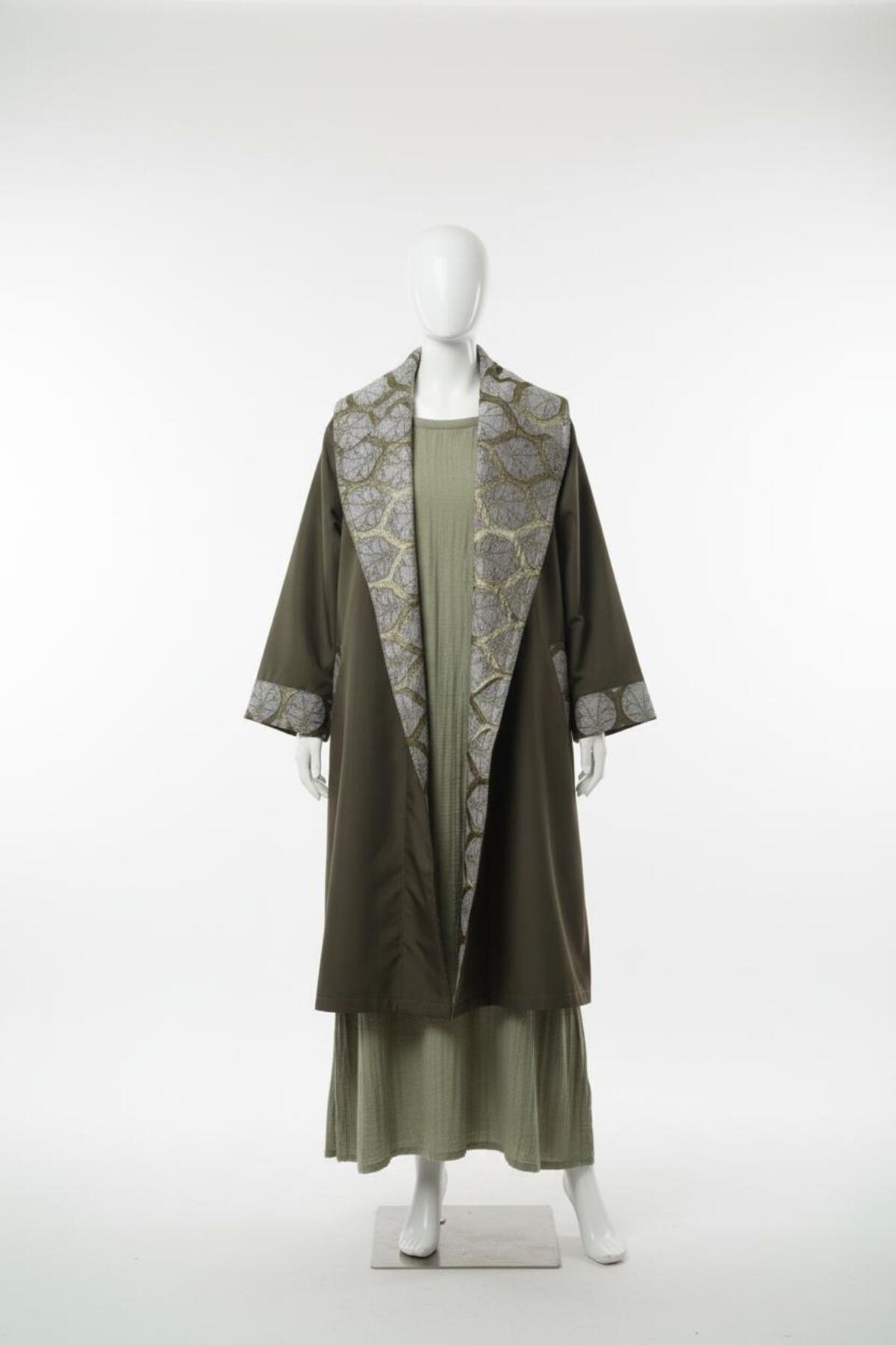 Su Koleksiyon  Şahmeran yakası kilim detaylı Su Geçirmez Jakarlı Kaftan