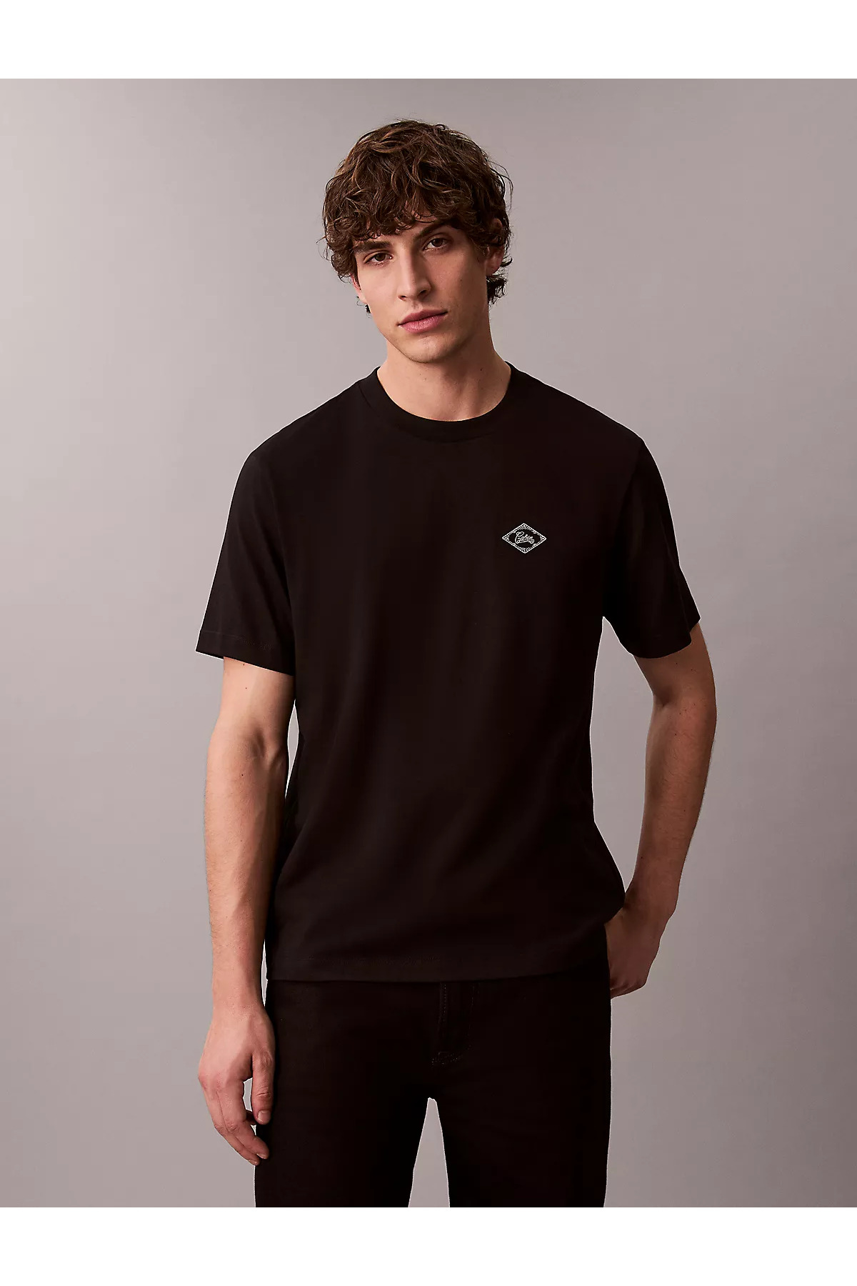کلوین کلاین تی‌شرت آستین کوتاه مردانه یقه گرد CK طرح Lettering Detail سایز معمولی مشکی LV04RE802G-UB1