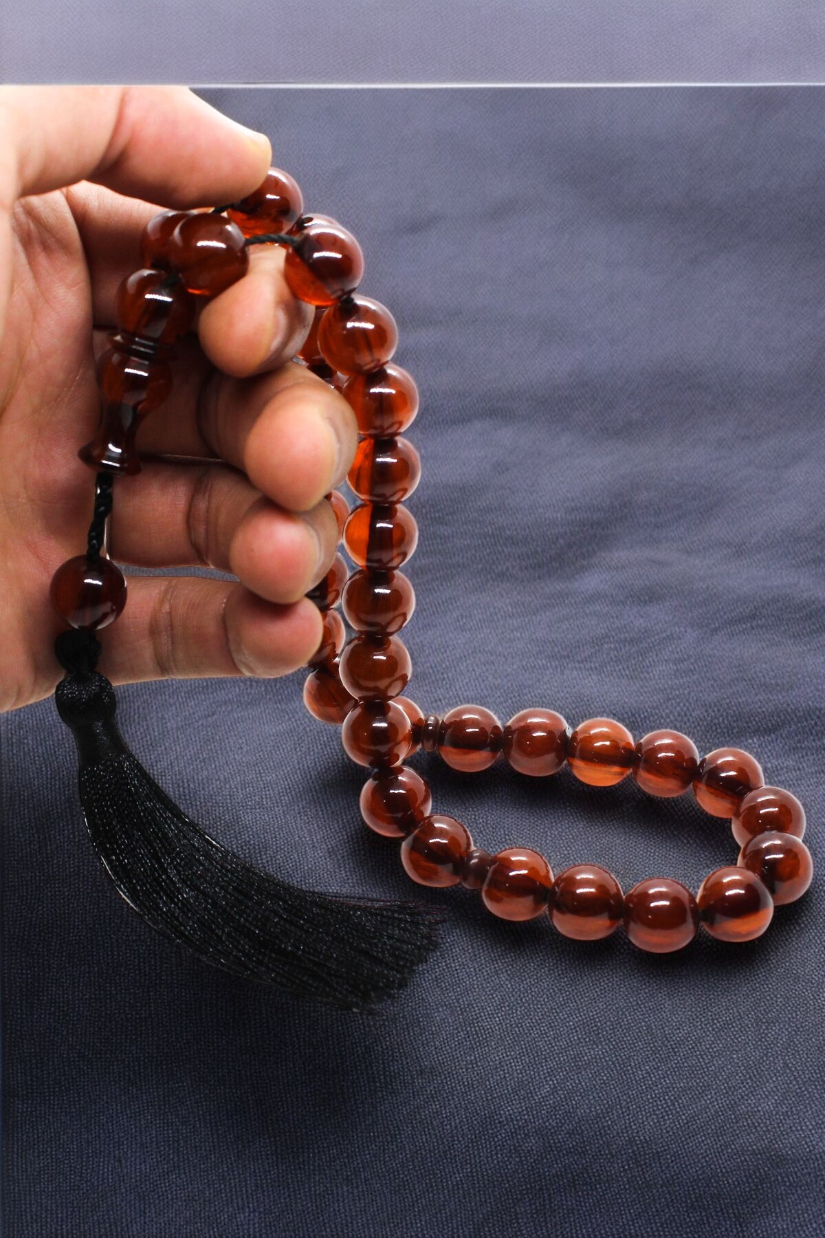 Certified 33-Piece Large Efe Mascot Smacking Fire Amber Rosary