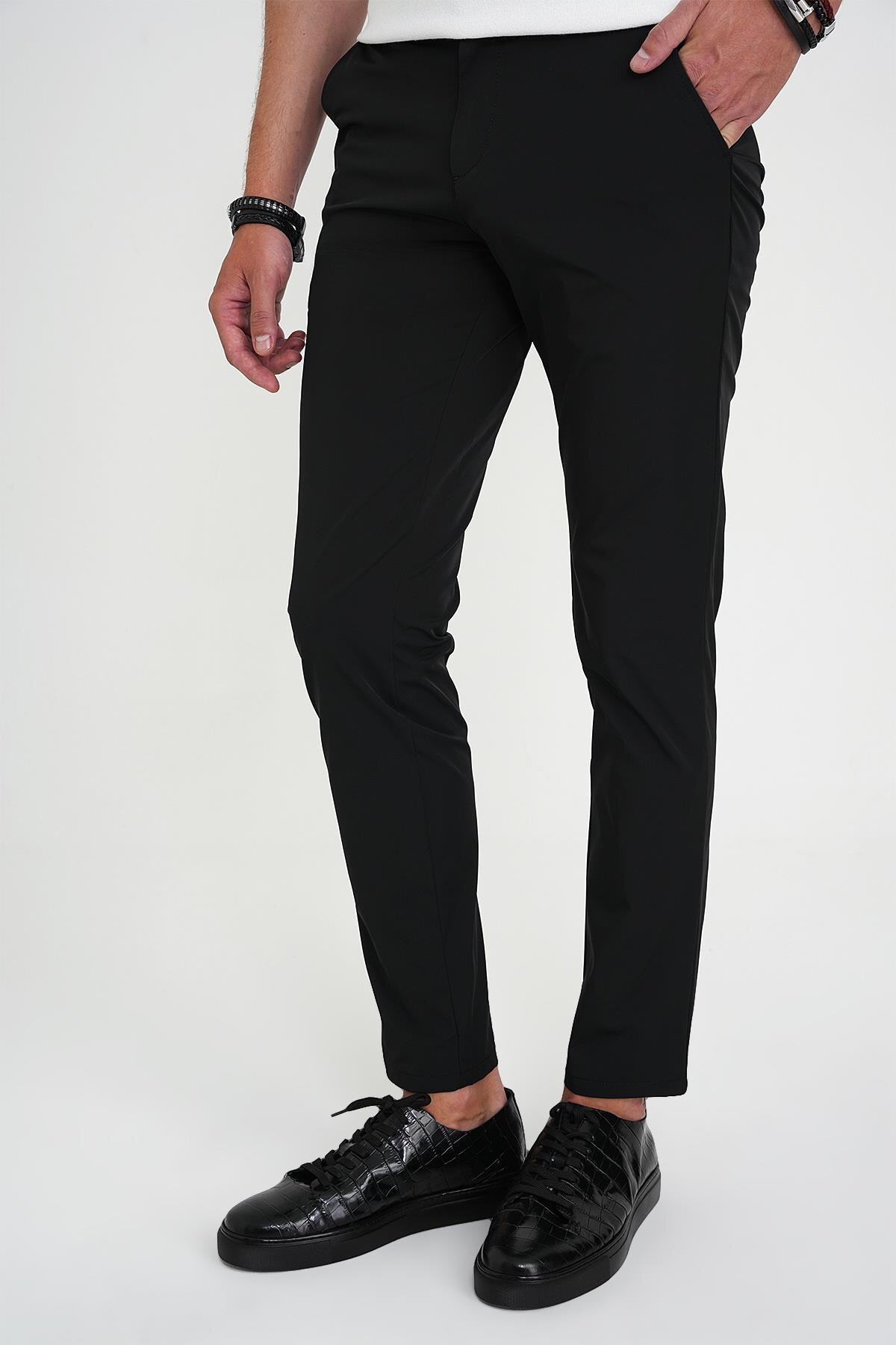 شلوار راحتی مردانه مشکی، برش آزاد، انعطاف‌پذیر، نخی نرم P 1190 — مشکی P1190Y0125 — تصویر 2 از 7