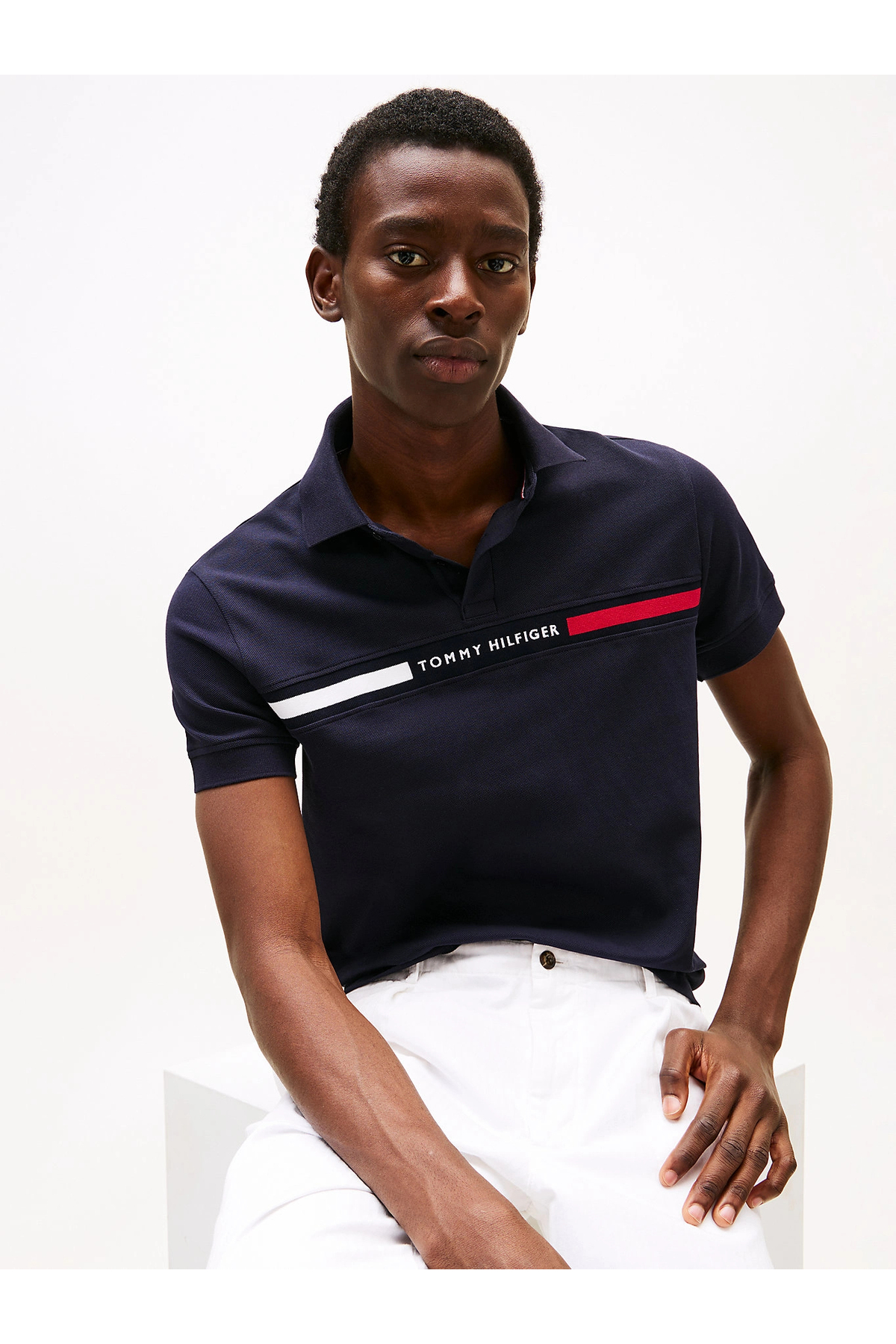 تامی هیلفیگر تی شرت مردانه یقه گرد سرمه ای طرح لوگو راه راه