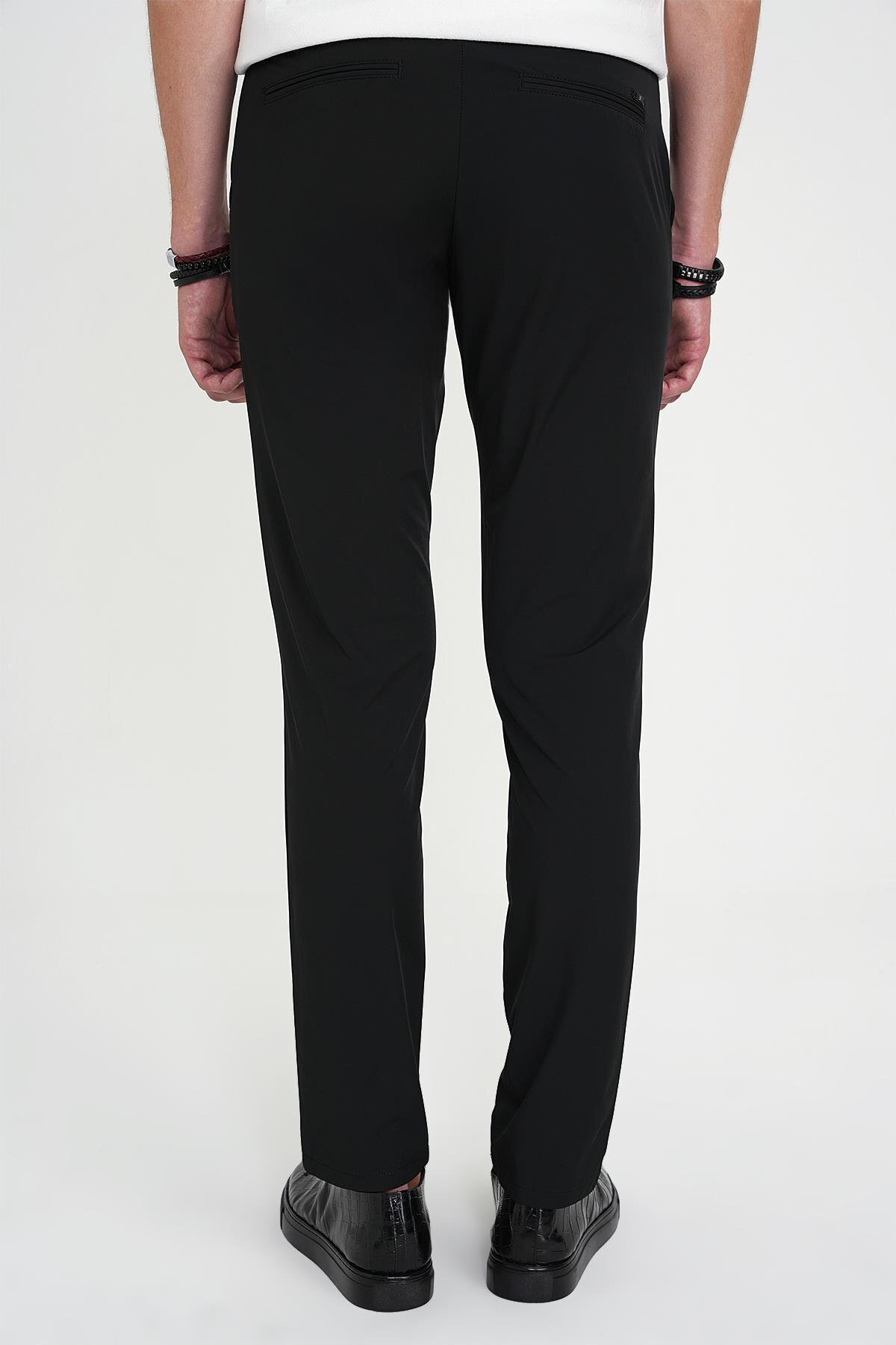 شلوار راحتی مردانه مشکی، برش آزاد، انعطاف‌پذیر، نخی نرم P 1190 — مشکی P1190Y0125 — تصویر 5 از 7
