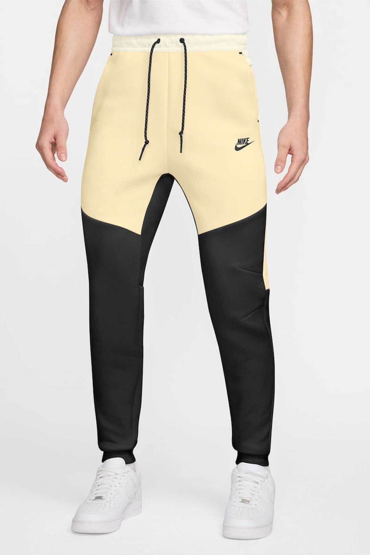 شلوار ورزشی مردانه Tech Fleece Slim Fit مدل Track Jogger به رنگ کرم نایکی شلوار ورزشی Nike