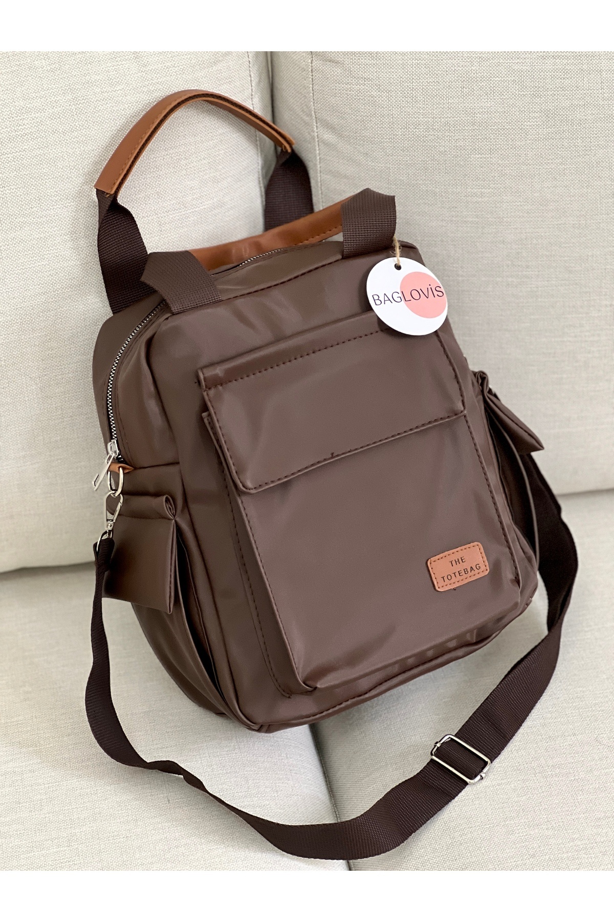 BAGLOVİS  YANLARI VE ÖNÜ CEP DETAYLI KAHVE KADIN SIRT ÇANTASI