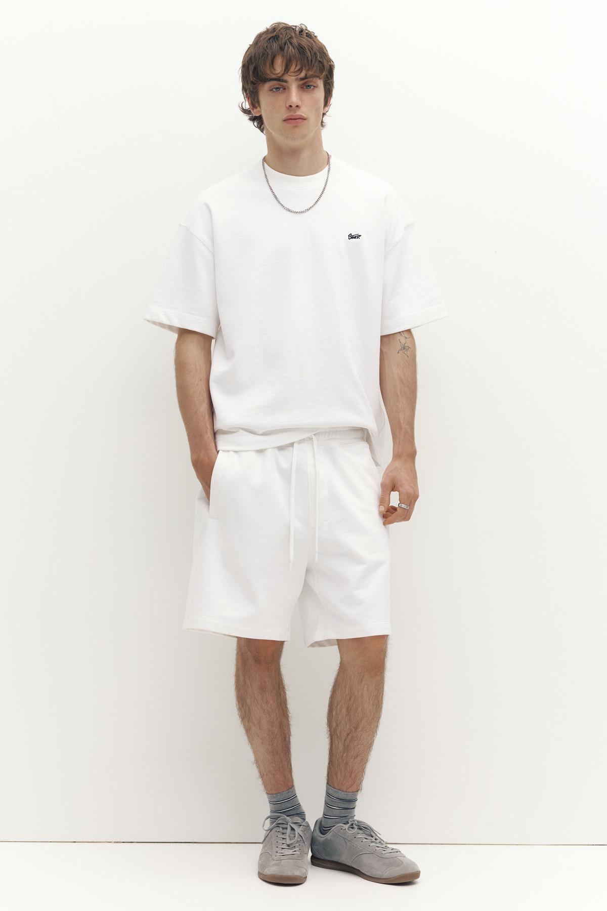 Jogger bermuda shorts with logo
