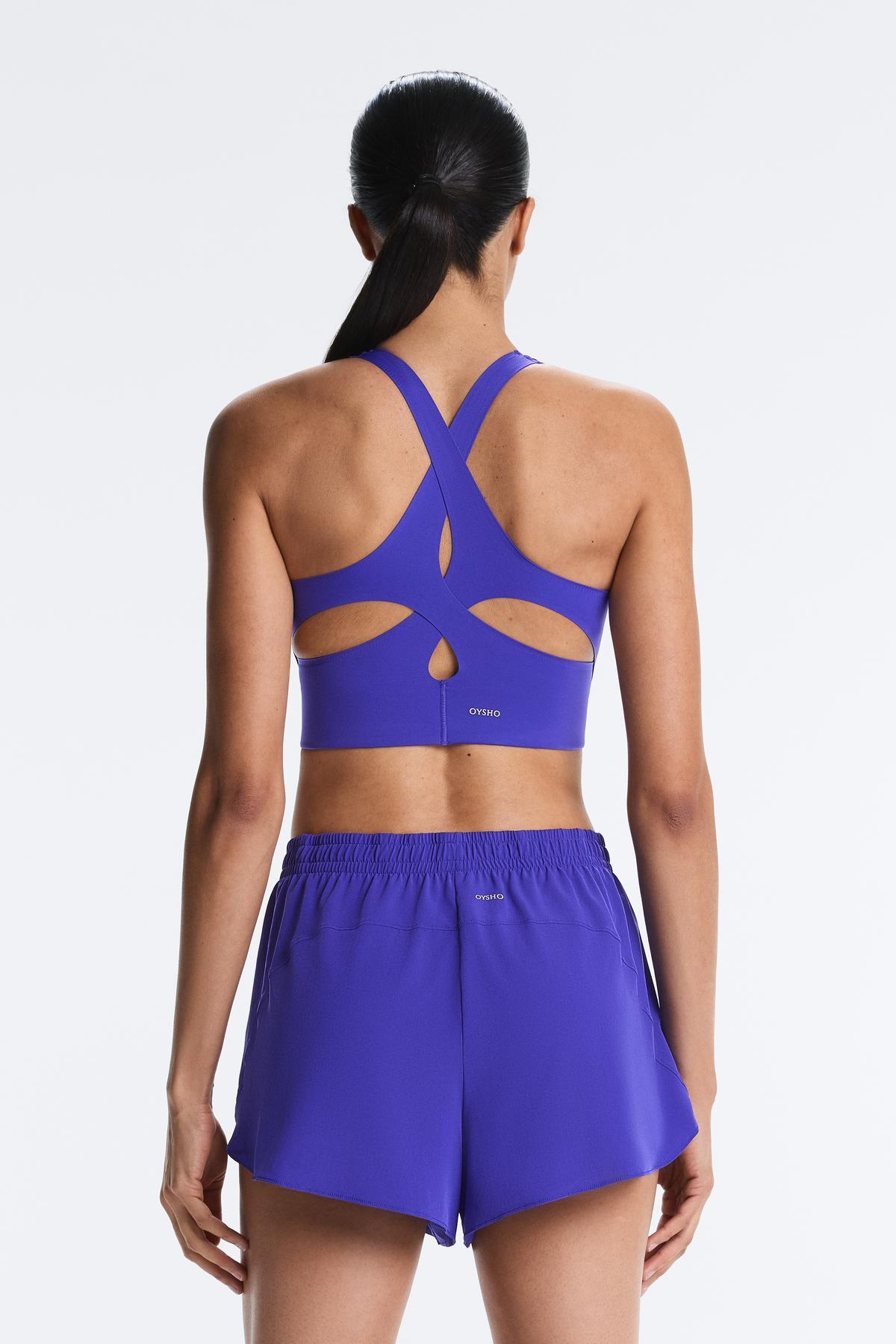 Diagonal back light touch tank top