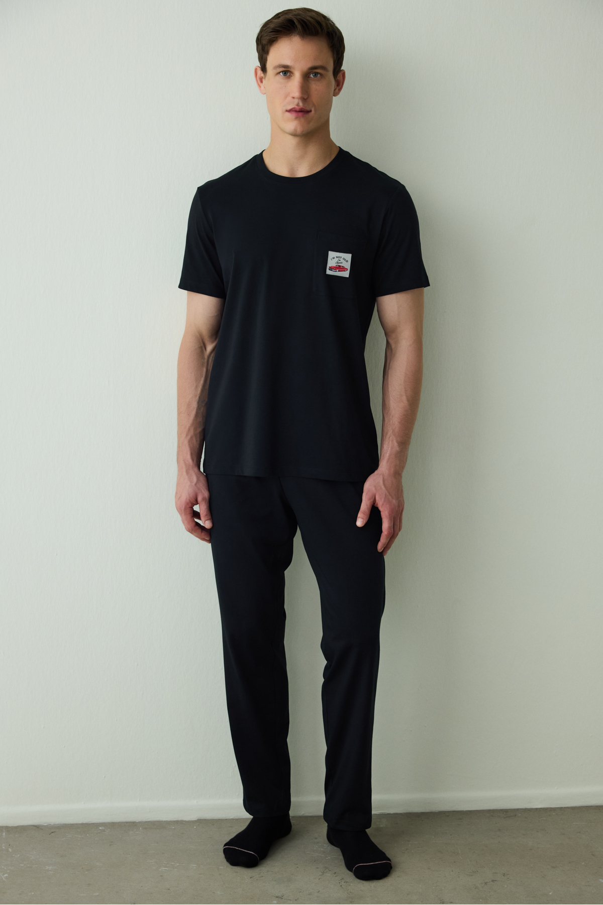 Penti Čierna pánska pyžamová súprava s krátkym rukávom a sloganom