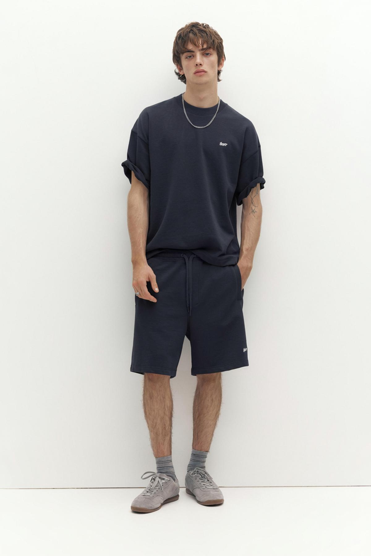 Jogger bermuda shorts with logo