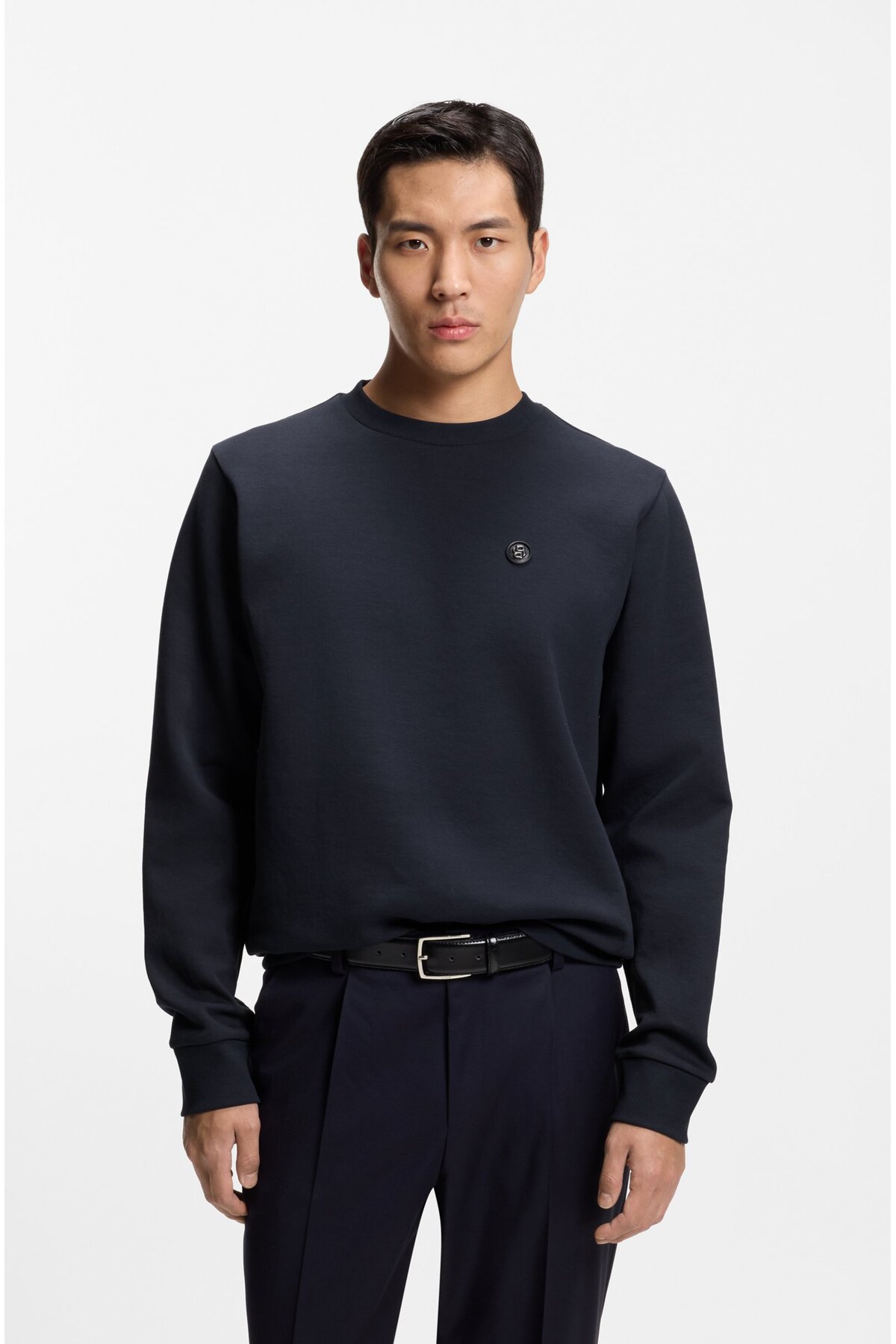 باس سویشرت مردانه یقه گرد طرح لوگودار سرمه‌ای پارچه‌ای اینترلاک نخی کد ۵۰۵۵۵۸۳۰-۴۰۴