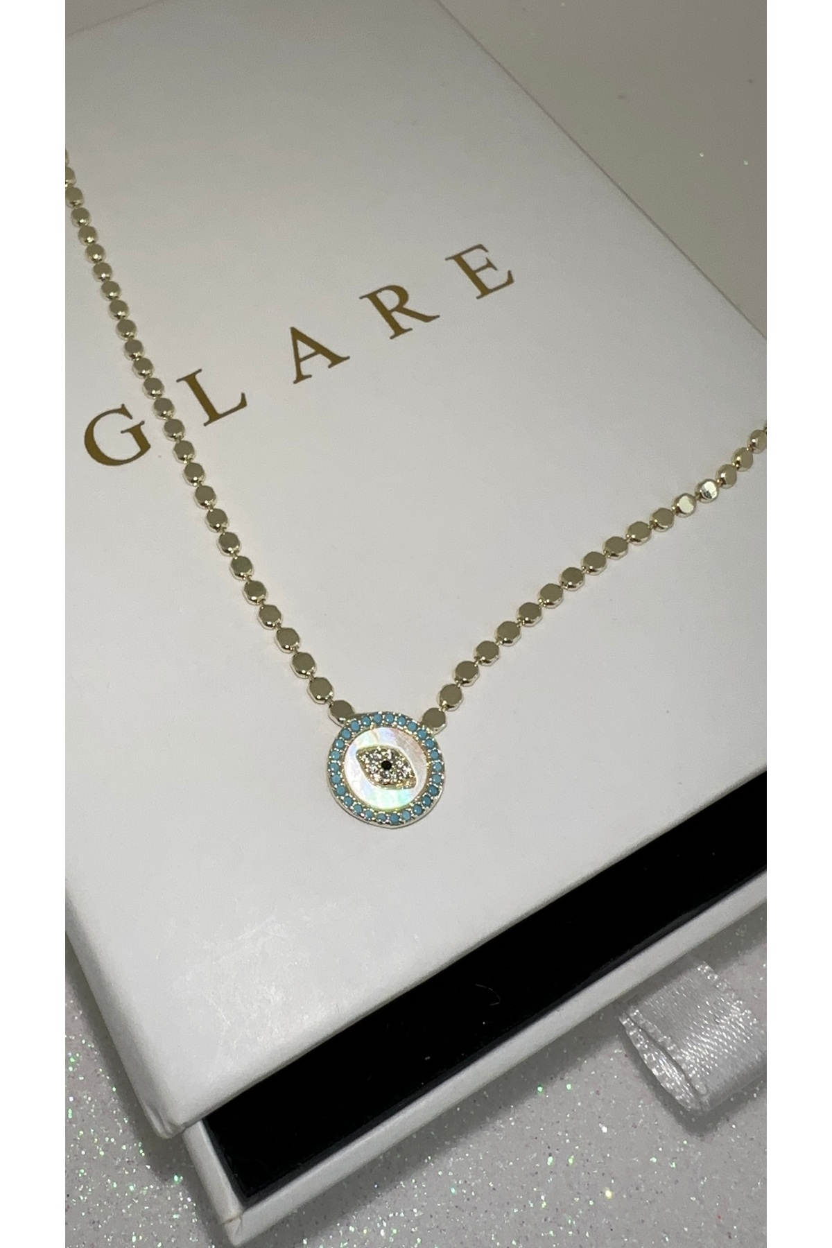 GLARE JEWELRY CO  Melis Göral Modeli Dorika Göz Zirkon Taşlı Paslanmaz Çelik Kolye 14k Altın Renginde