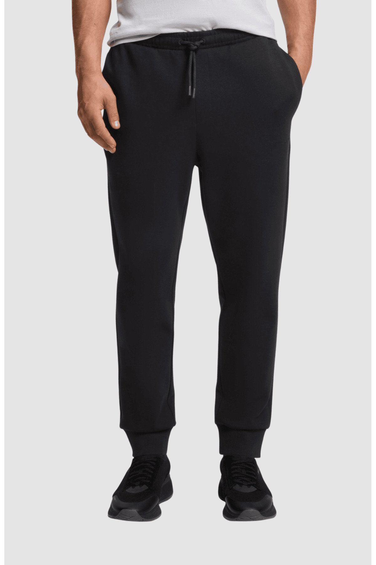 باس شلوار ورزشی مردانه معمولی، کمر کشی و سرآستین‌دار، مشکی، ساخته شده از پنبه کشی، کد ۵۰۵۵۵۵۰۵-۰۰۱