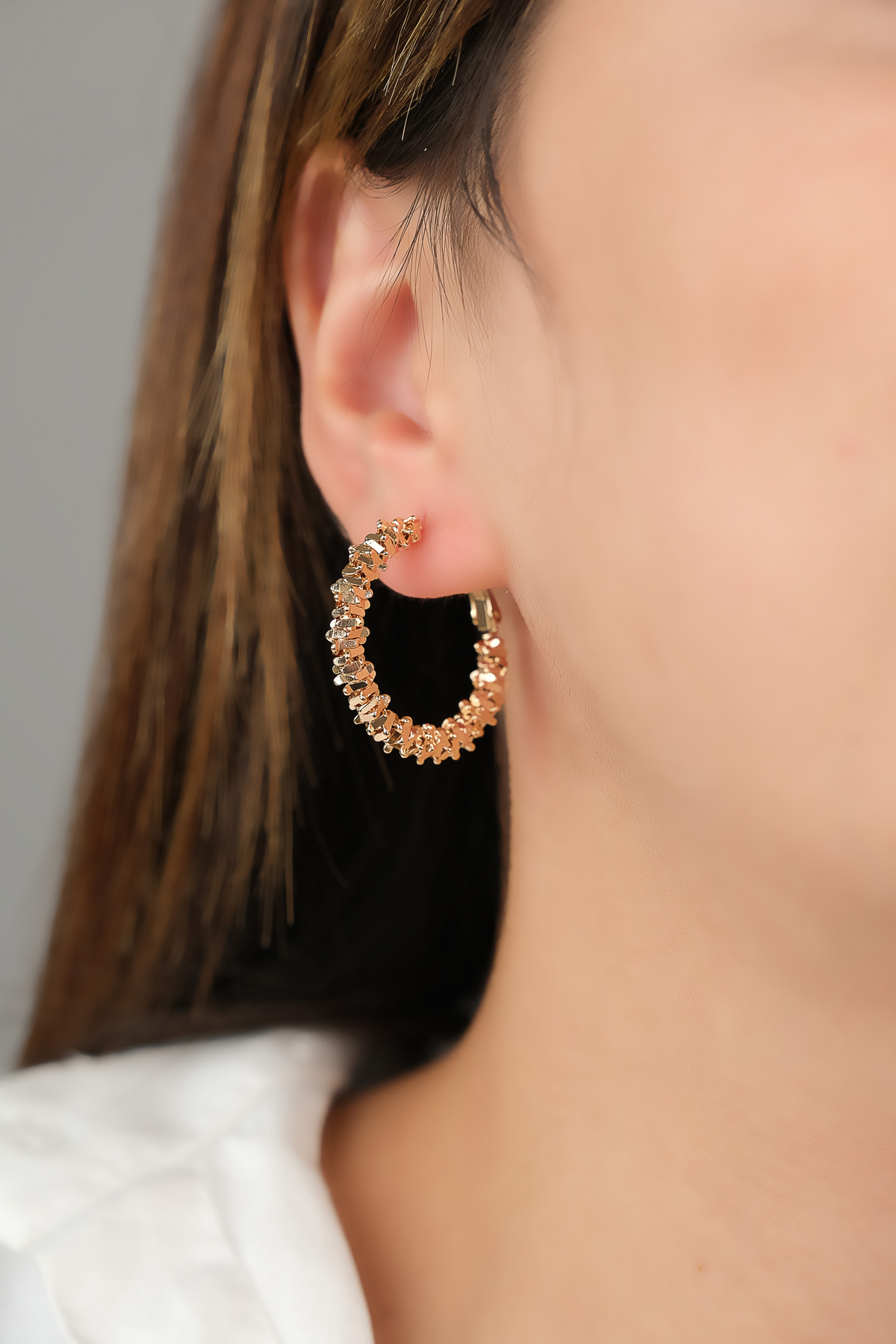 STEEL COLORLESS GUARANTEED BILLED EARRINGS