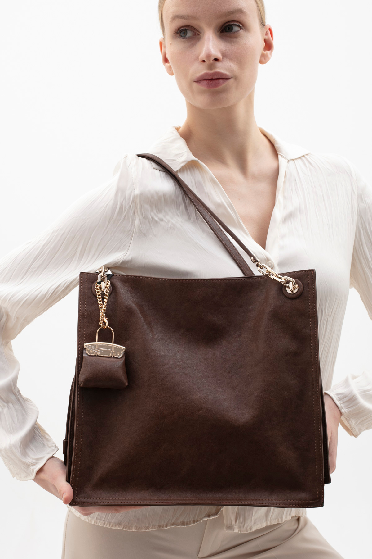 WOMEN 'S SLEEVE BAG BROWN BYN2483