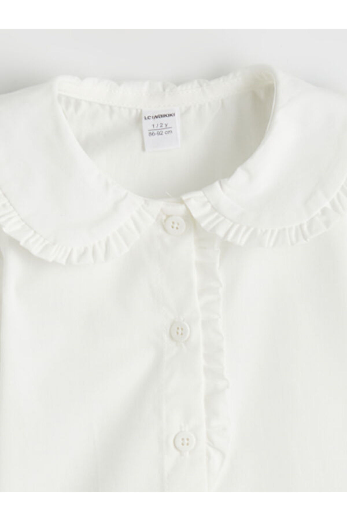 LC Waikiki Freezen Store'dan I Fırfırlı Bebe Roba Yaka Poplin Kız Çocuk Gömlek fotoğrafı 3 (önizleme)