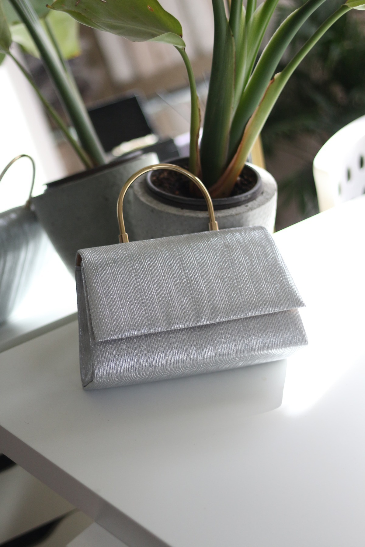 Women's Silver Laser Cut Evening Bag with Metal Retention Handle Cover