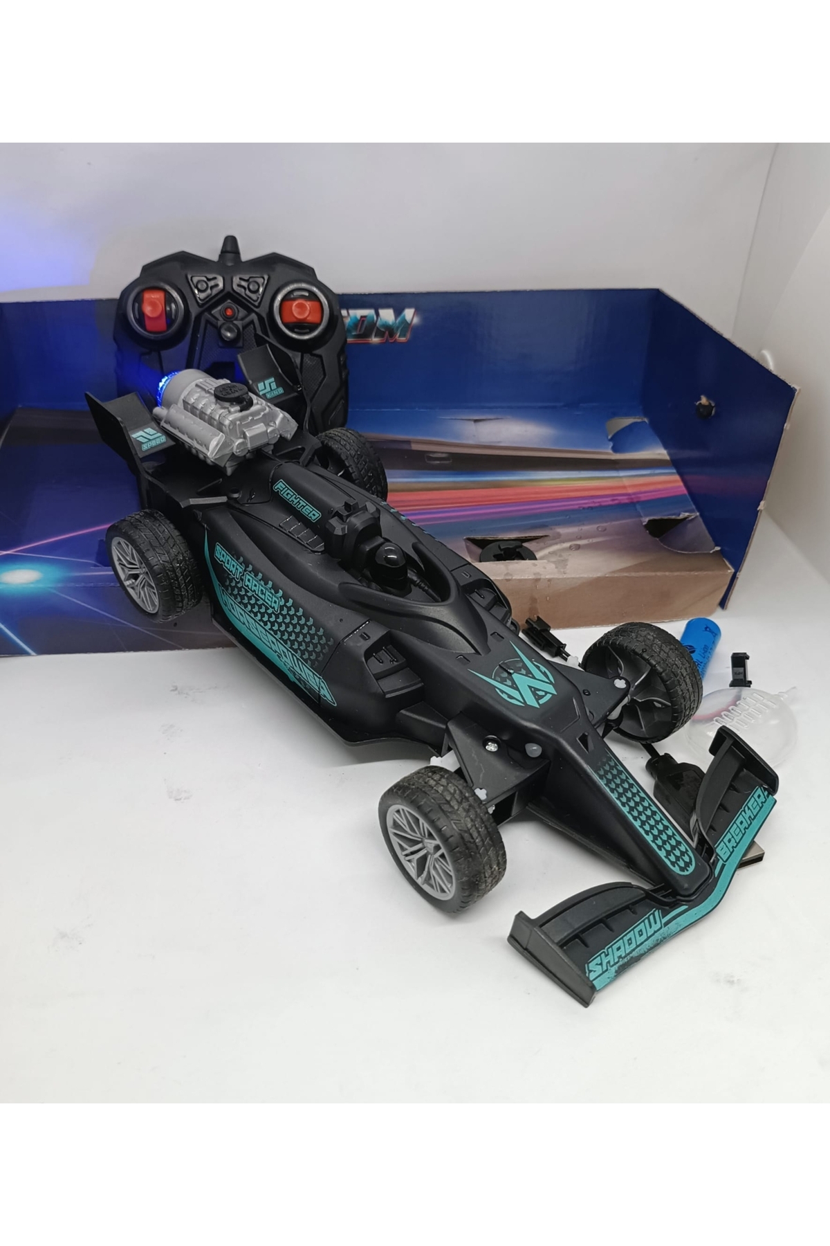 LRS STORE Uzaktan Kumandalı Şarjlı Araba Full Fonsiyon F1 Formula 1 Arabası Buhar Çıkaran fotoğrafı 3 (önizleme)