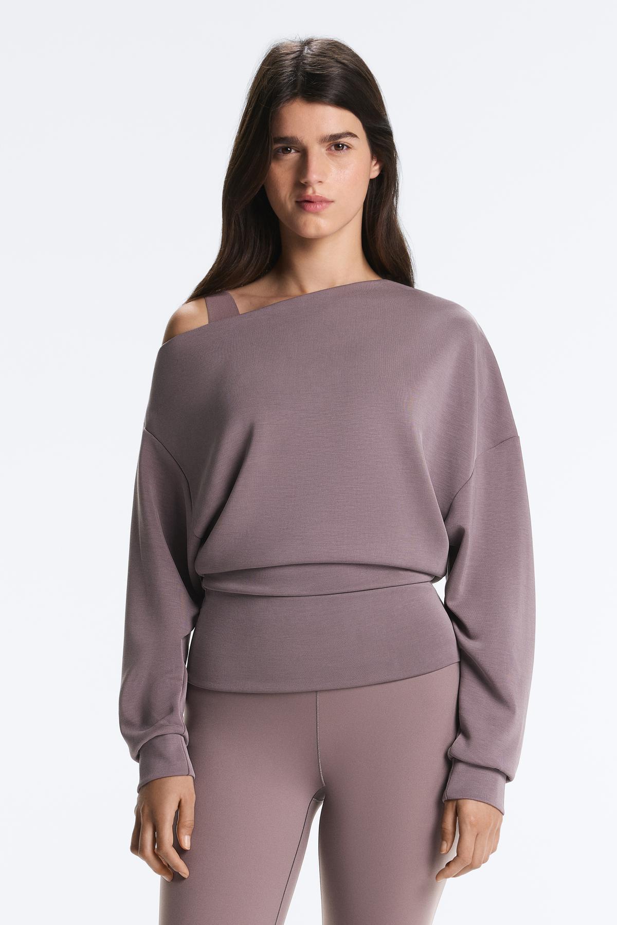Soft textured modal sweatshirt with asymmetrical collar and fitting waist