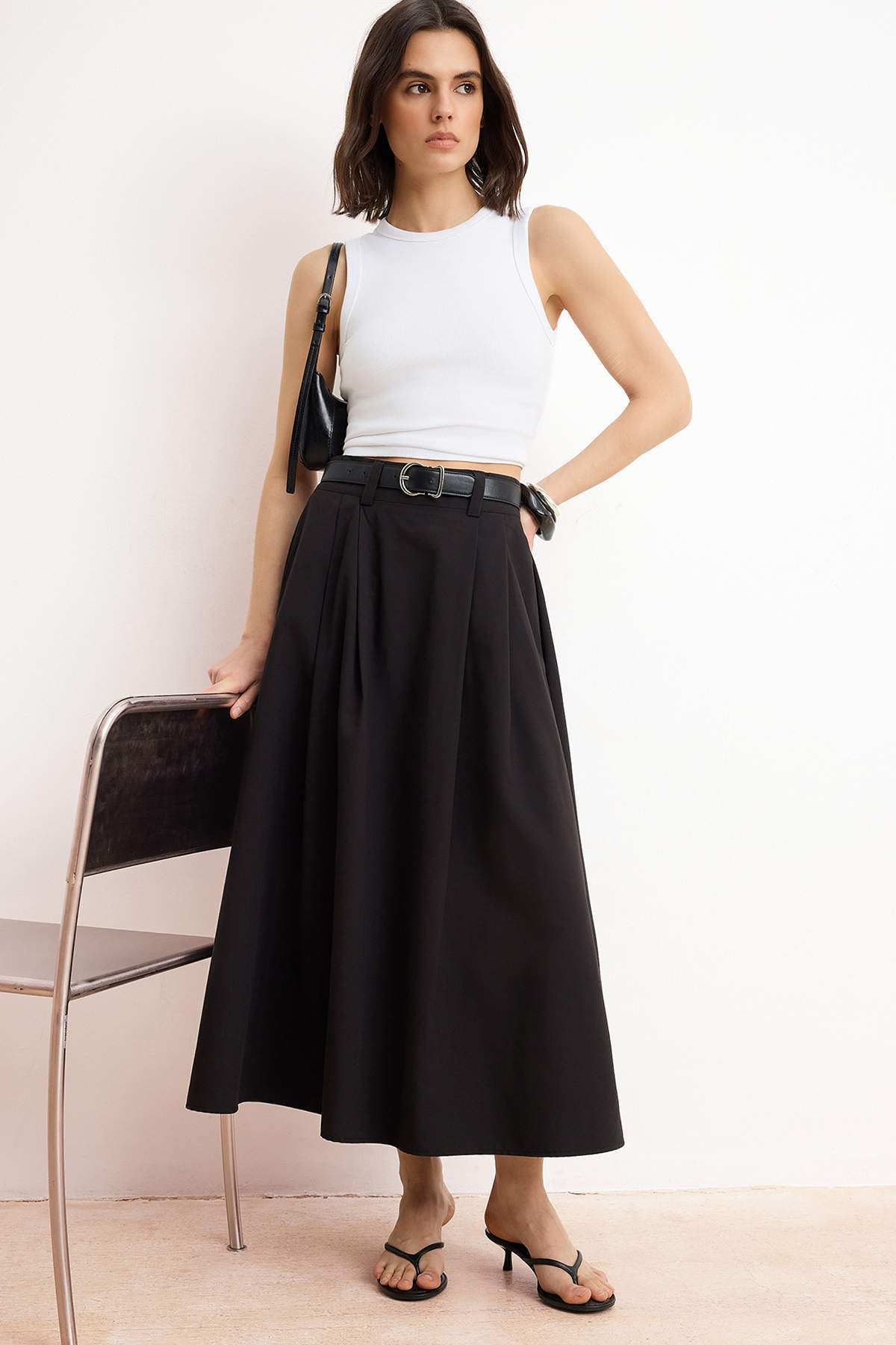 Trendyol Collection Fekete redőzött Maxi hosszúságú szőtt szoknya TEDAW25ET00000