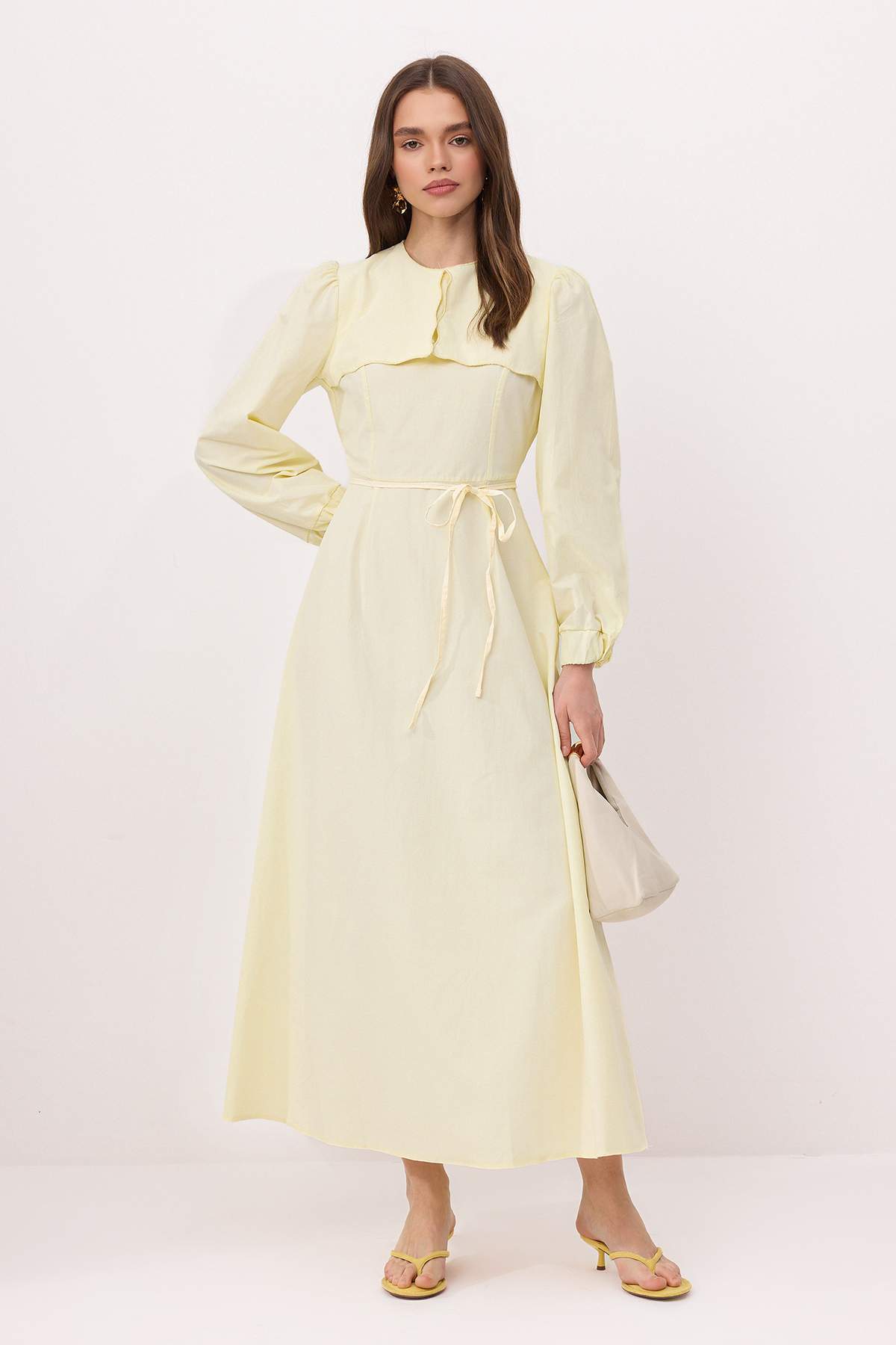 Trendyolmilla Modest Sarı Bebe Yaka Kolu Lastikli Maxi Kuşaklı Dokuma Tesettür Elbise TCTSS26EB00132