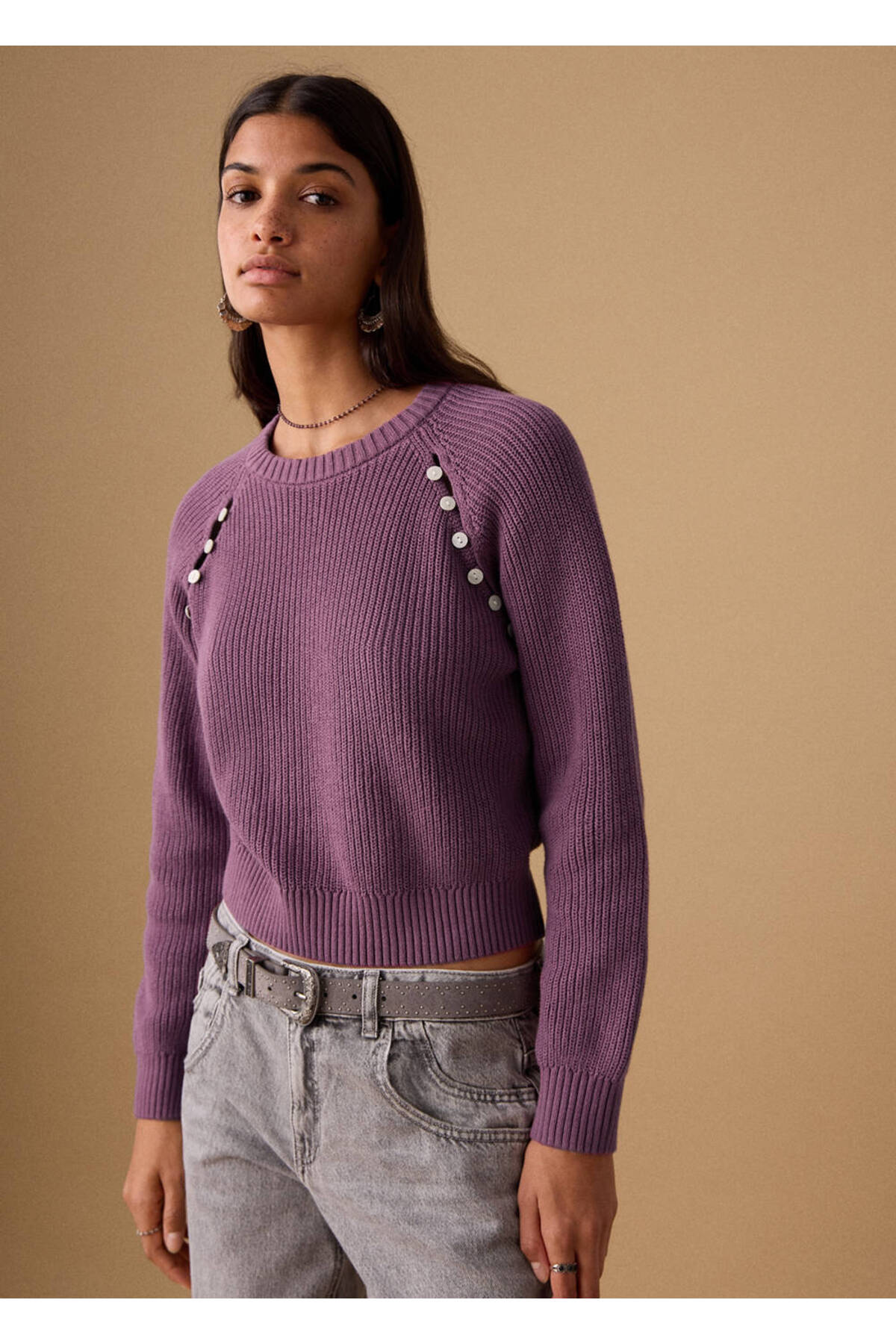 Knitted sweater with button detail