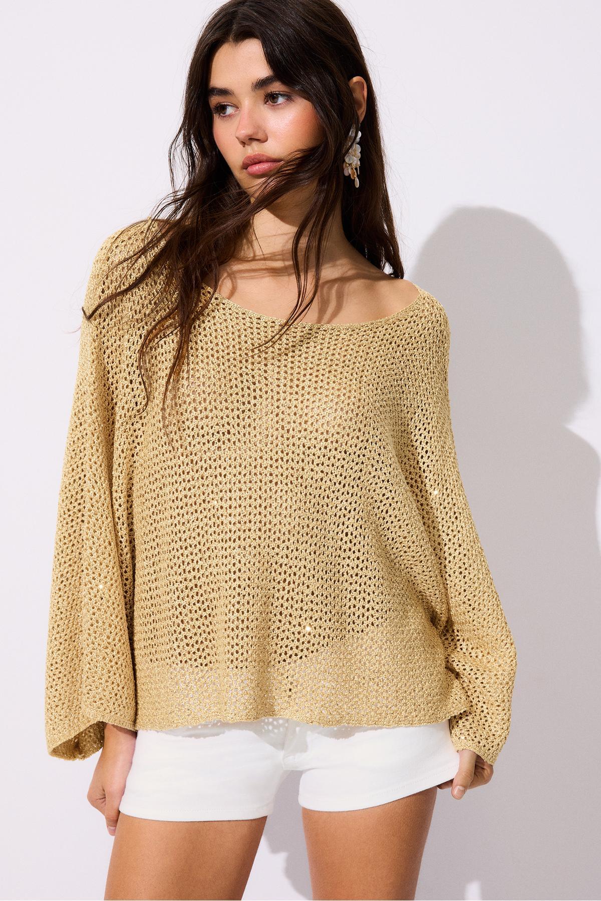 Stradivarius  Işıltılı örgü pelerin