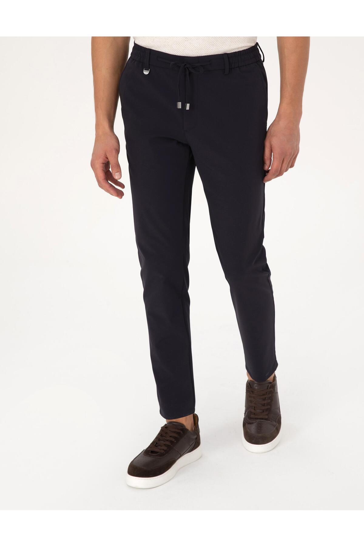 شلوار کلاسیک مخصوص دویدن، بسیار باریک و دارای کمر کشی. پیر کاردین شلوار Pierre Cardin