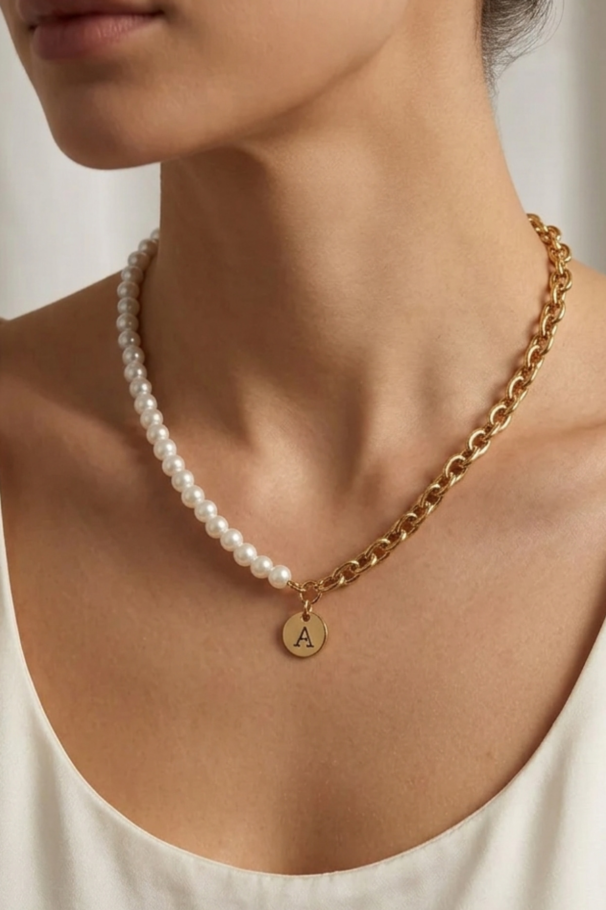 A Pearl Chain Letter Style Necklace