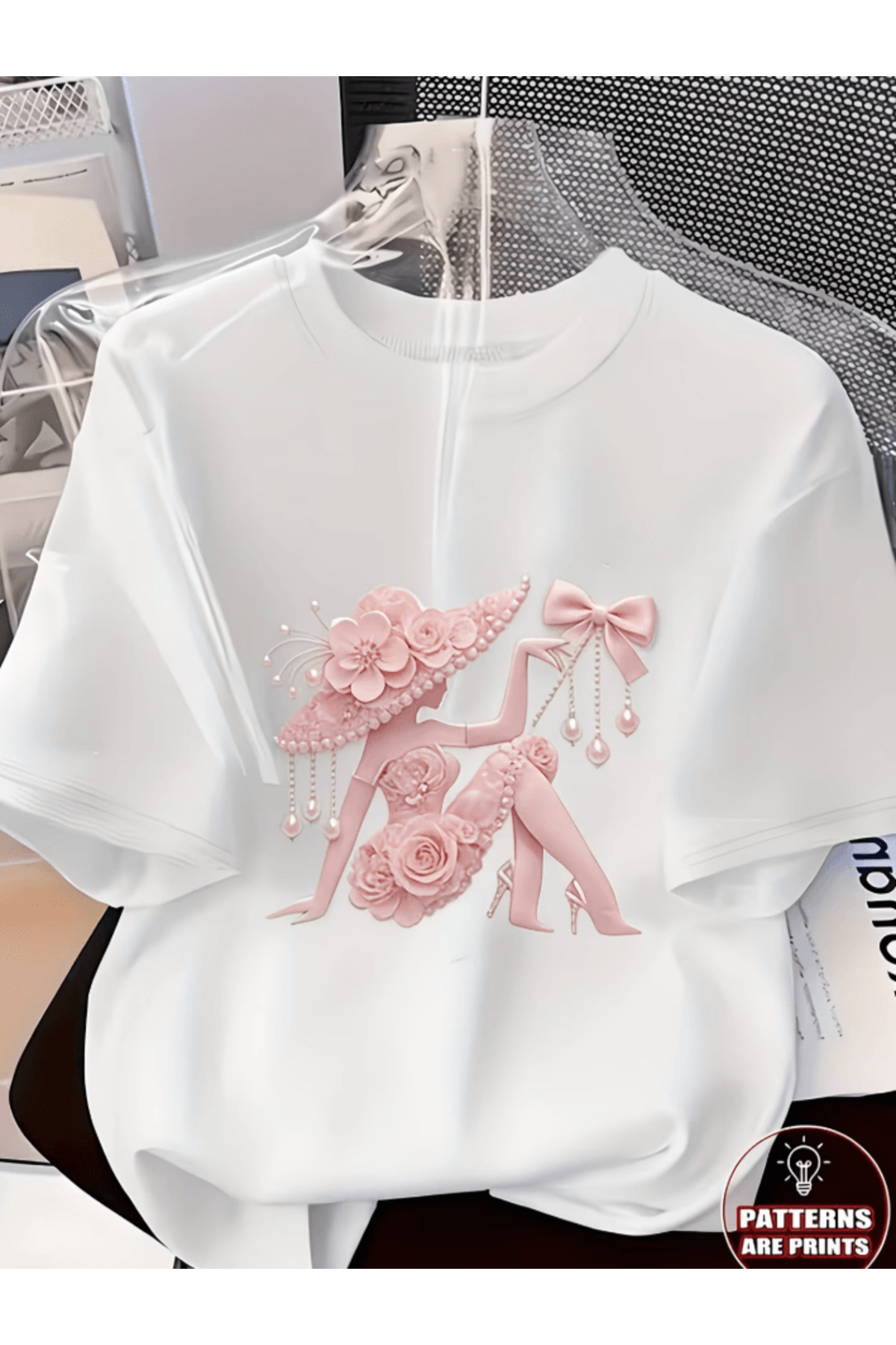 gencerco Ružičasta elegantna ženska majica sa detaljima od bisera i premium p...