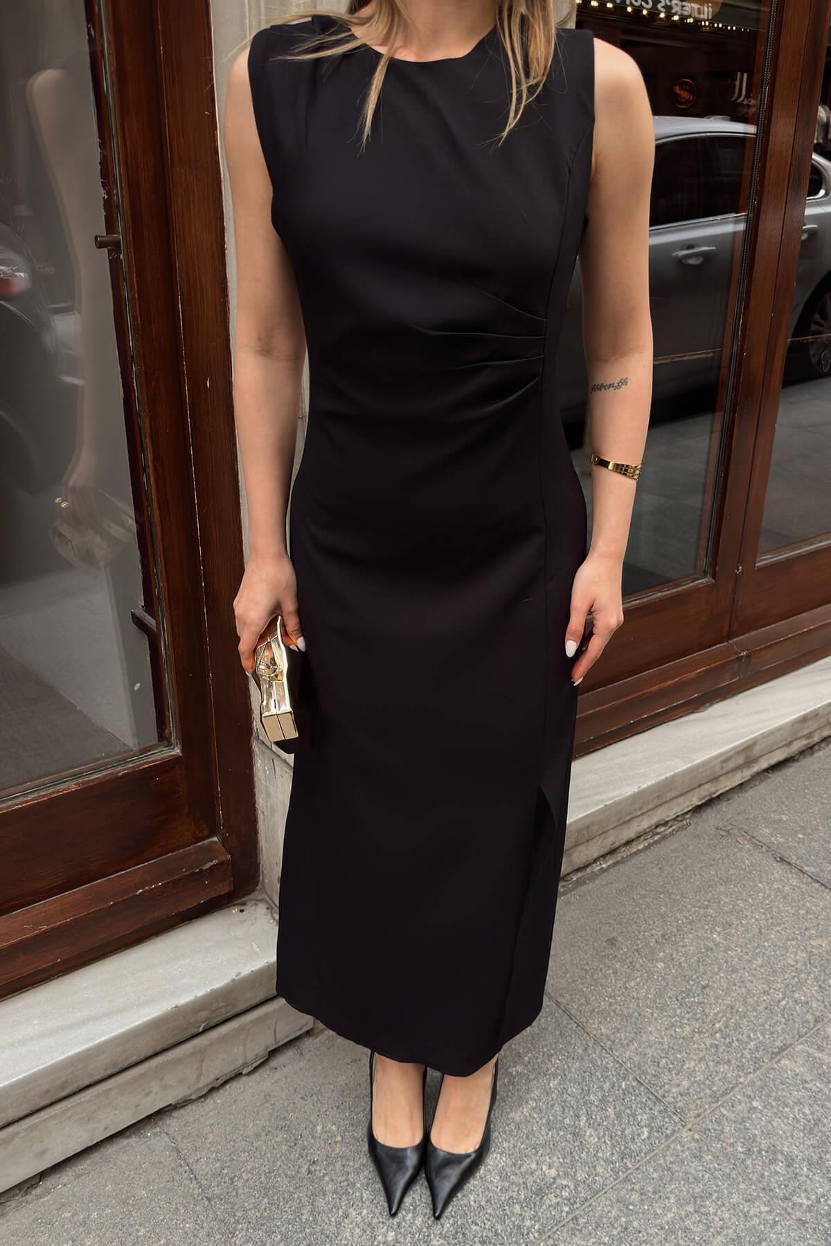 Swist Black Zero Sleeve Shoulder Pleated Waist Draped Front Slit