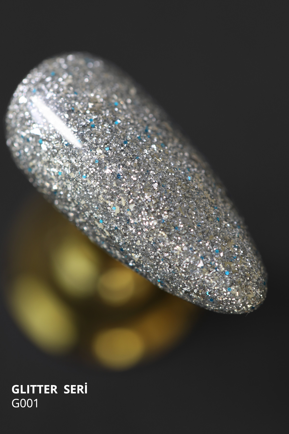 Glitter Kalıcı Oje G001, Yoğun Gümüş Simli, 4 ml — نقره‌ای 8860101A01S01G001 — تصویر 2 از 4