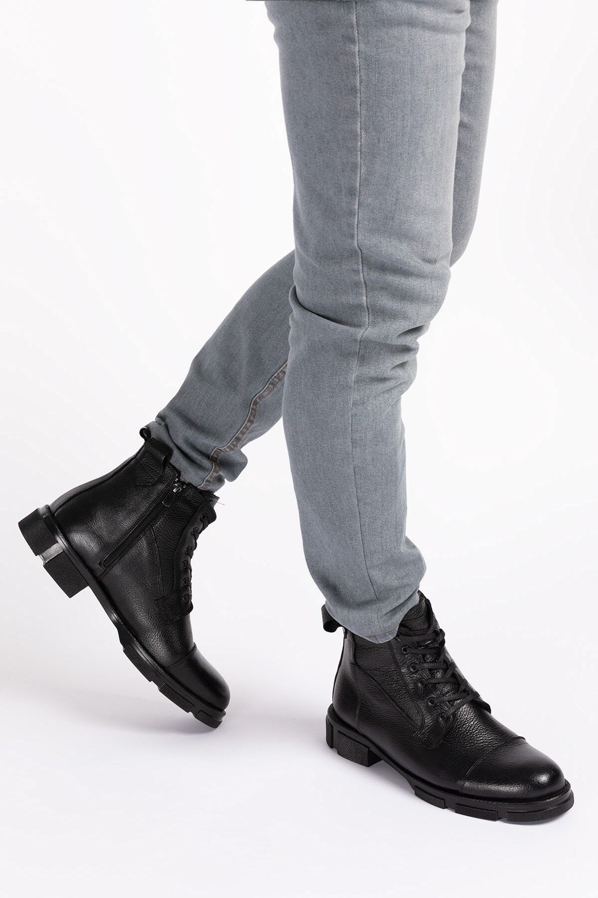 Leather boots with fur inside top