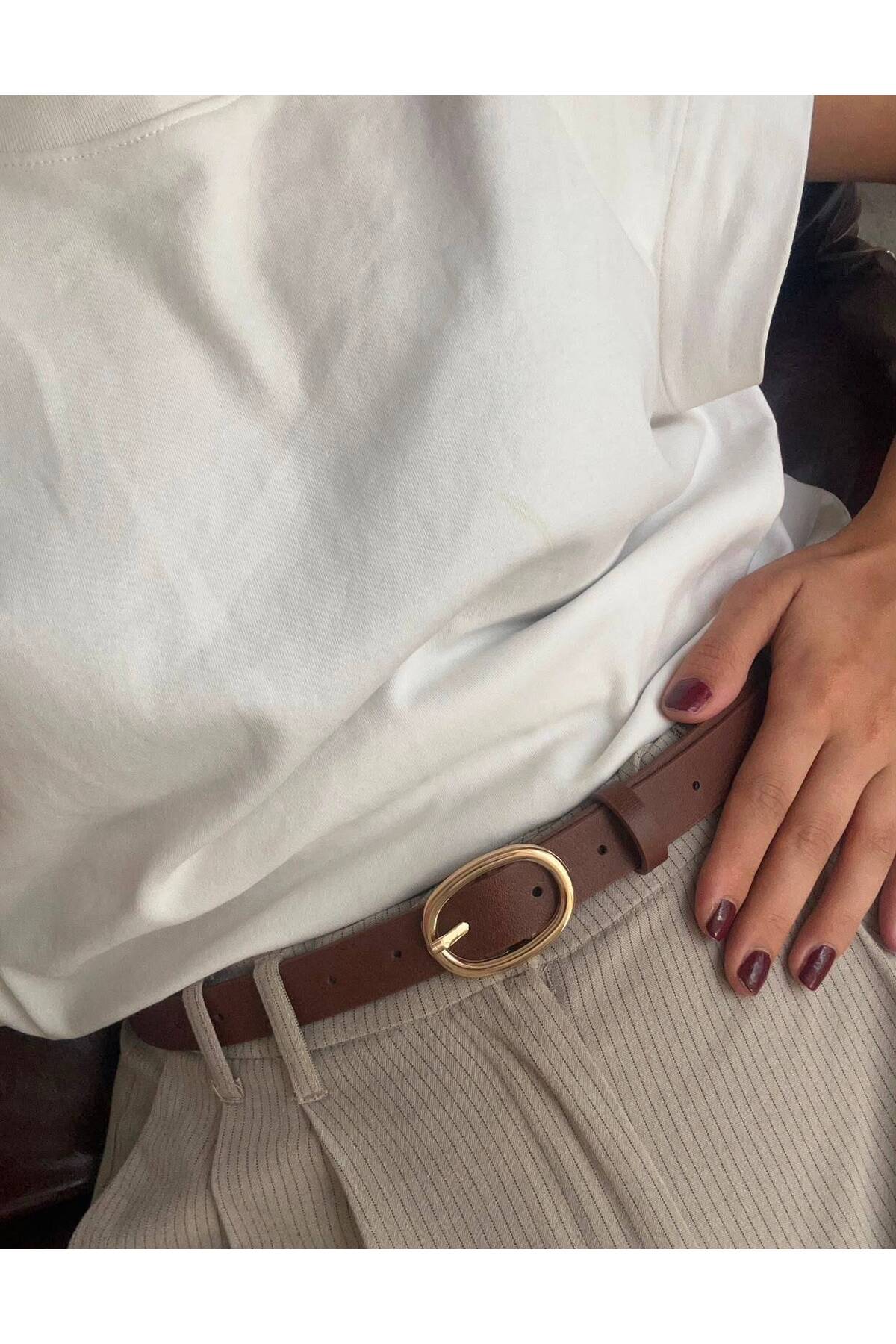 oval gold buckle belt