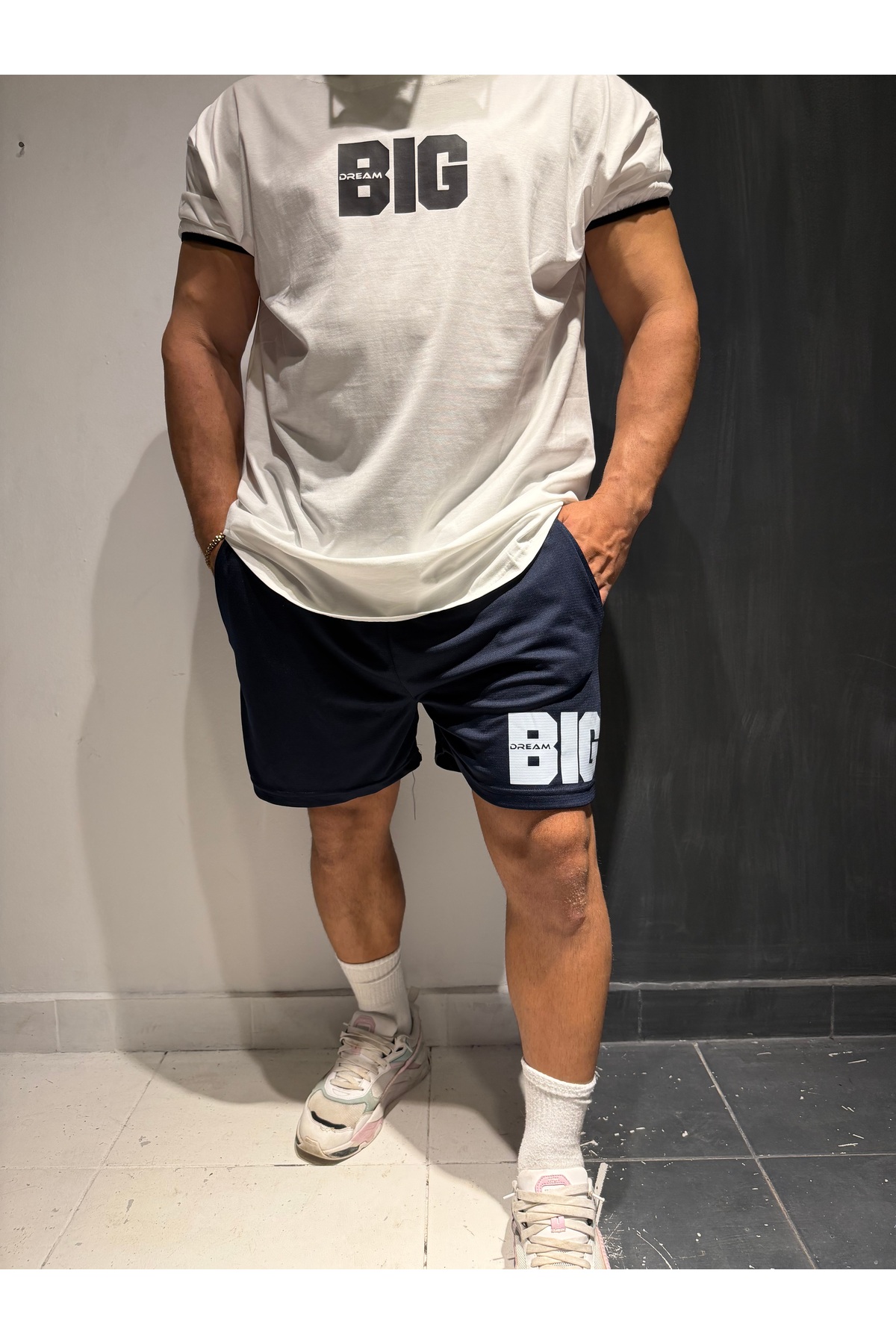 شلوارک ورزشی تناسب اندام طرح بزرگ سرمه‌ای  شورت ورزشی Bas Body FitnessWear