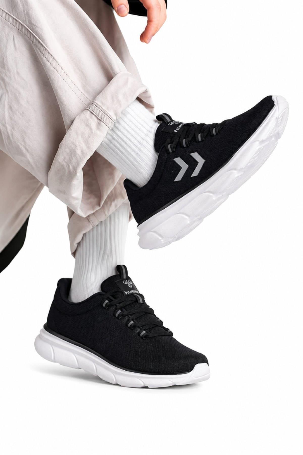 کفش‌های دویدن Tyro Unisex مدل ۹۰۰۸۹۹، ساختار راحت هامل کتانی تمرین و دویدن hummel