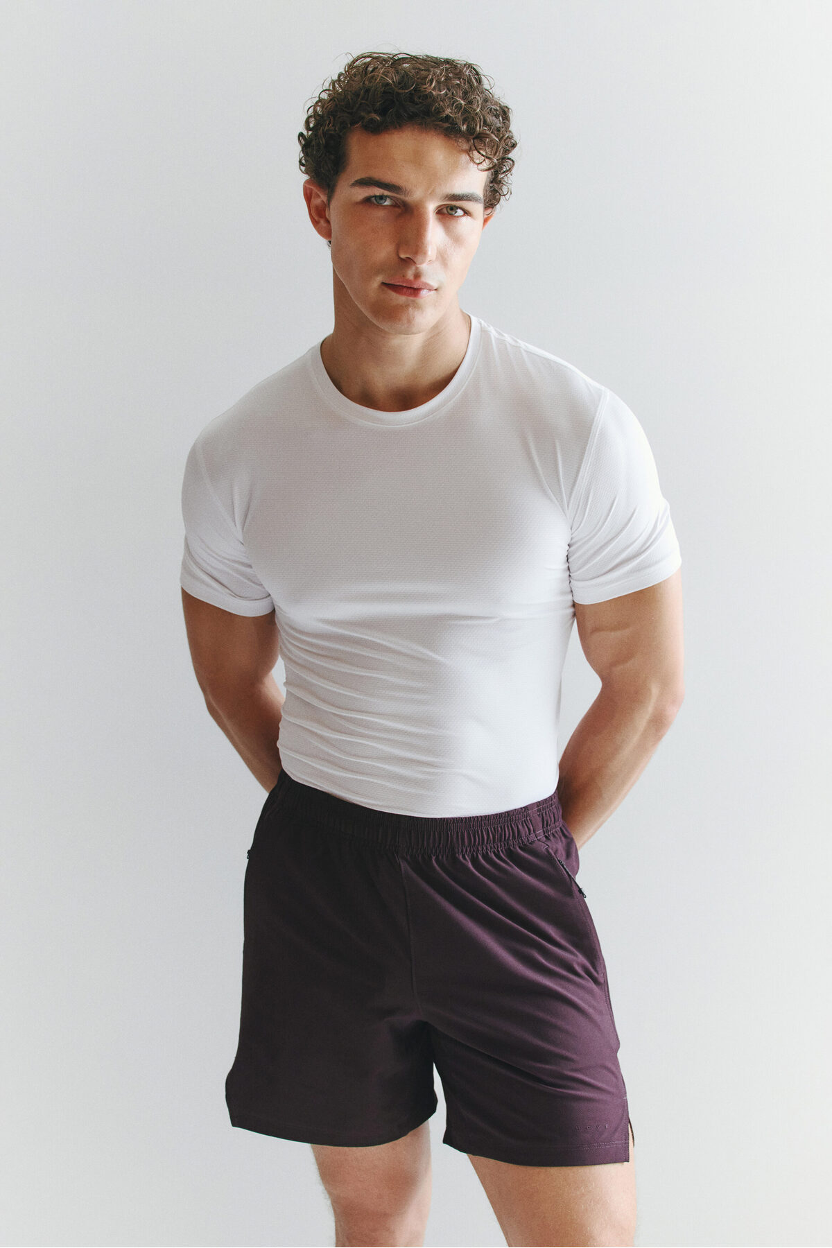 تاپ ورزشی Muscle Fit DryMove™ اچ اند ام زیرپیراهن ورزشی H&M