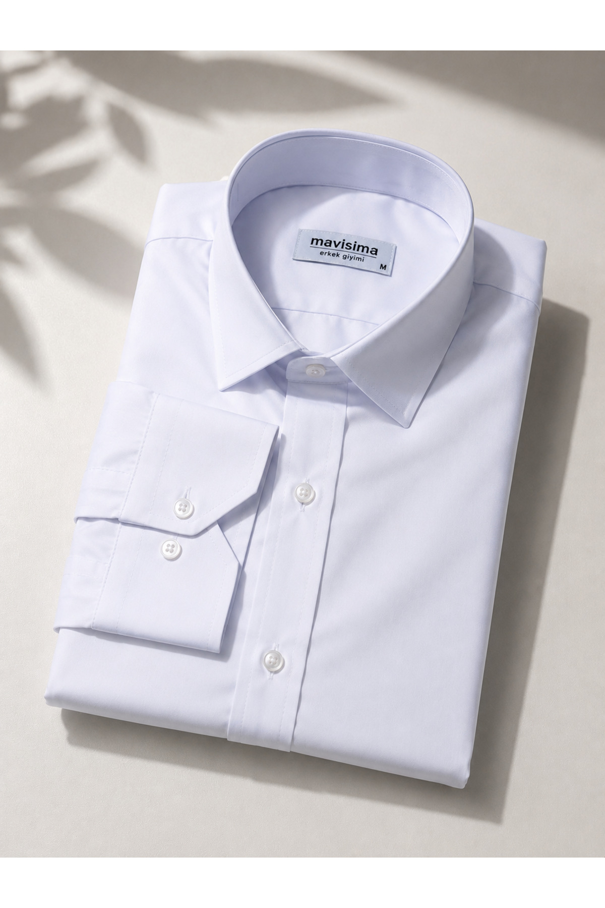 White slim-fit shirt for men with classic collar and long sleeves, suitable for suits and groom outfits