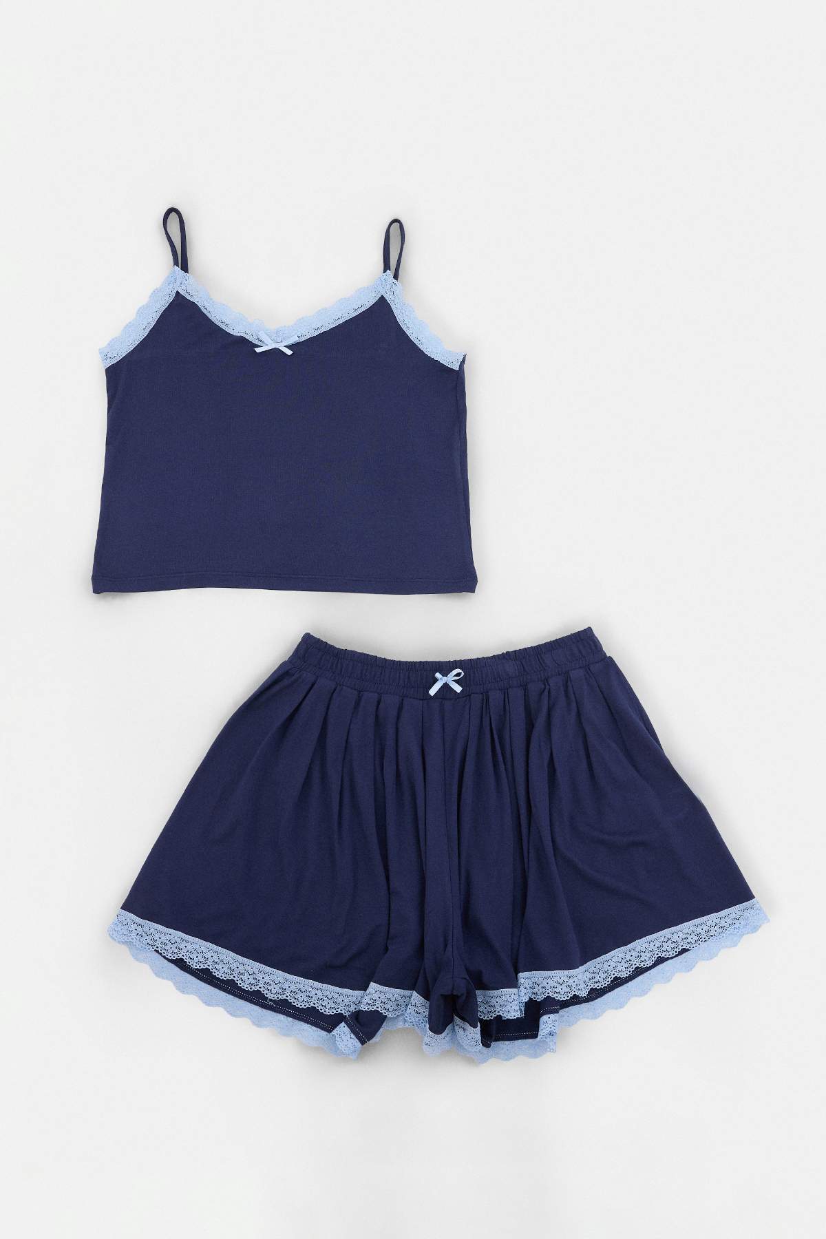 Trendyolmilla Lacivert Dantel Detaylı Etek Görünümlü Şort Örme Pijama Takımı THMSS26PT00147